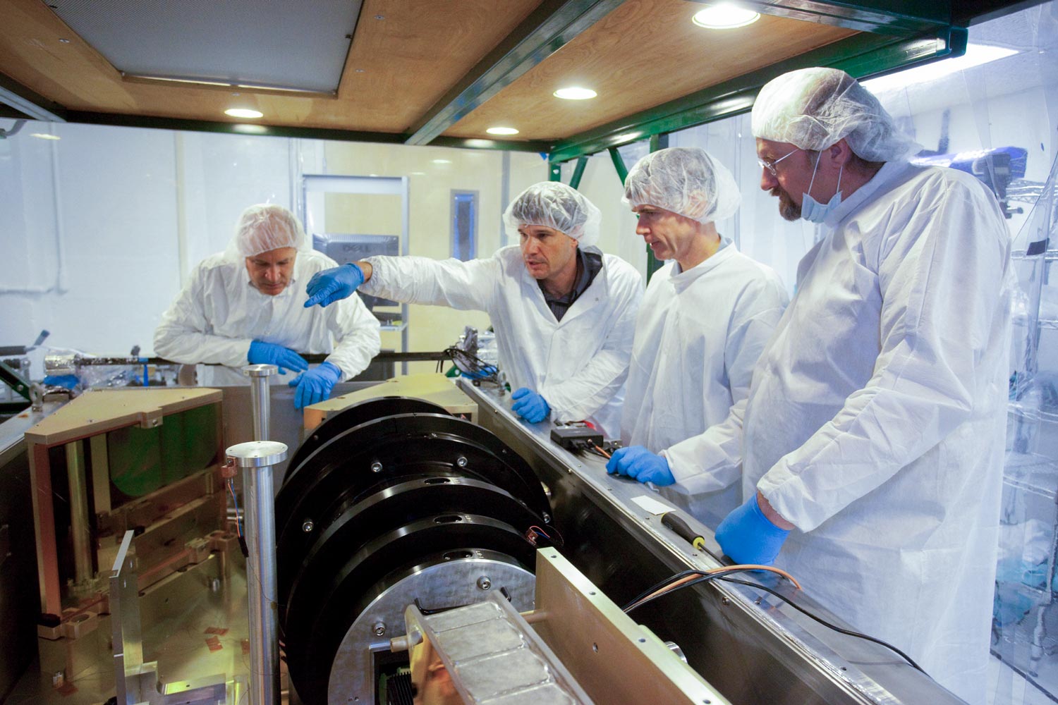 Wilson, second from left, and the UVA APOGEE team with the spectrograph before its final installation in New Mexico. (Photo by Peggy Harrison)