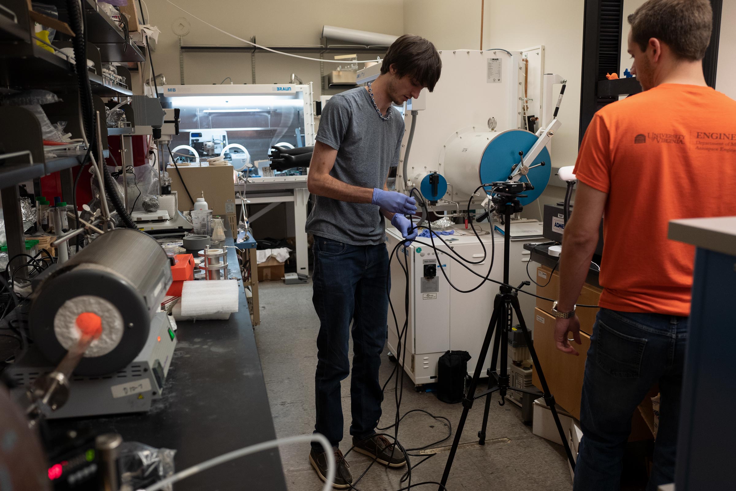 Oliver Holzmond and Jamison Bartlett calibrate a sensor that is on a tripod together
