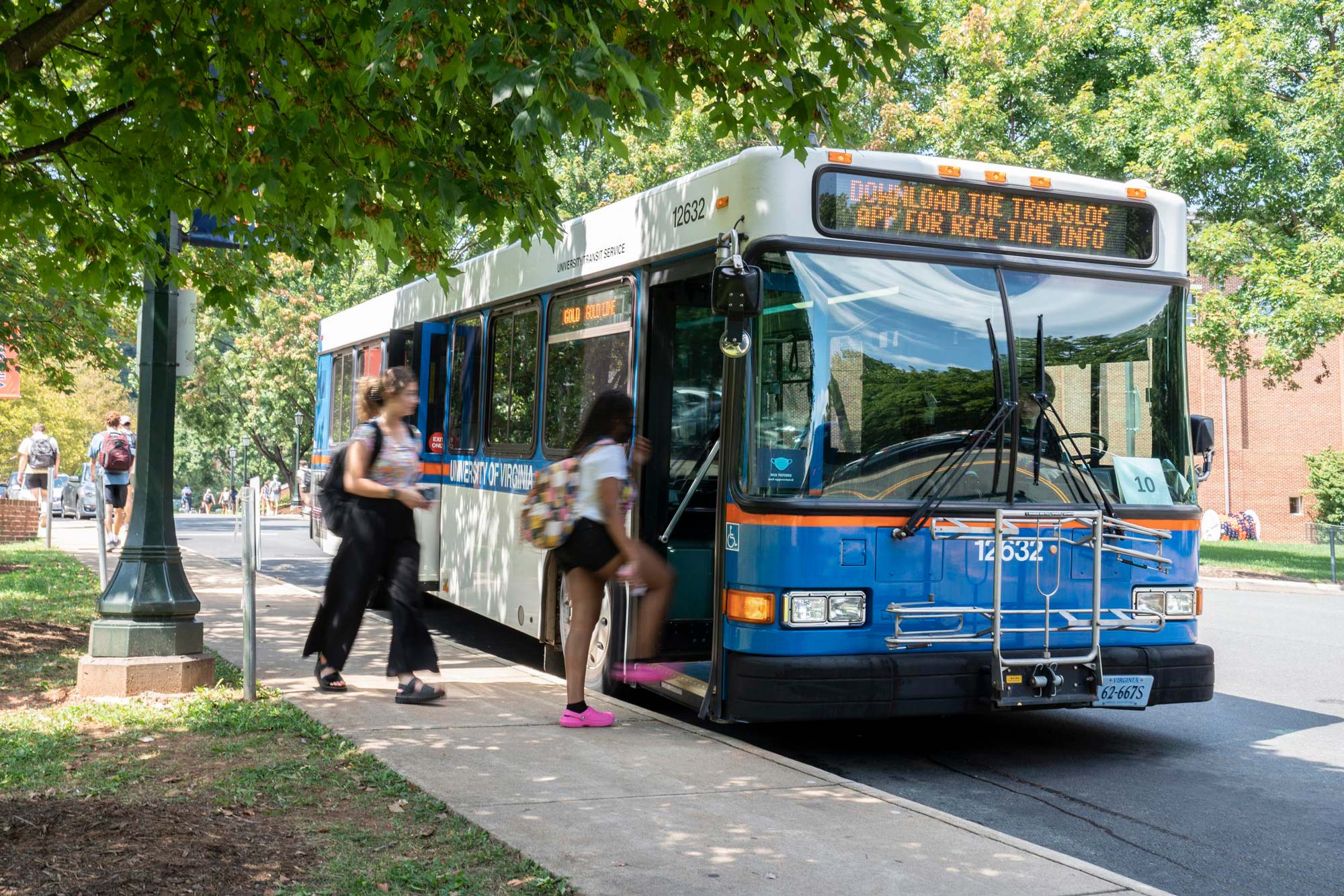 Students boarding the Charlottesville Area Transit bus