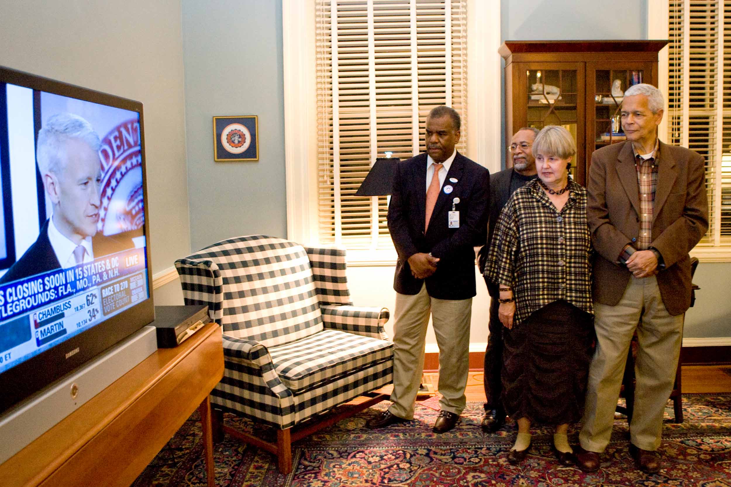 Dr. Marcus Martin, Pam Horowitz, and Julian Bond watching the 2008 election results coming in on T.V.