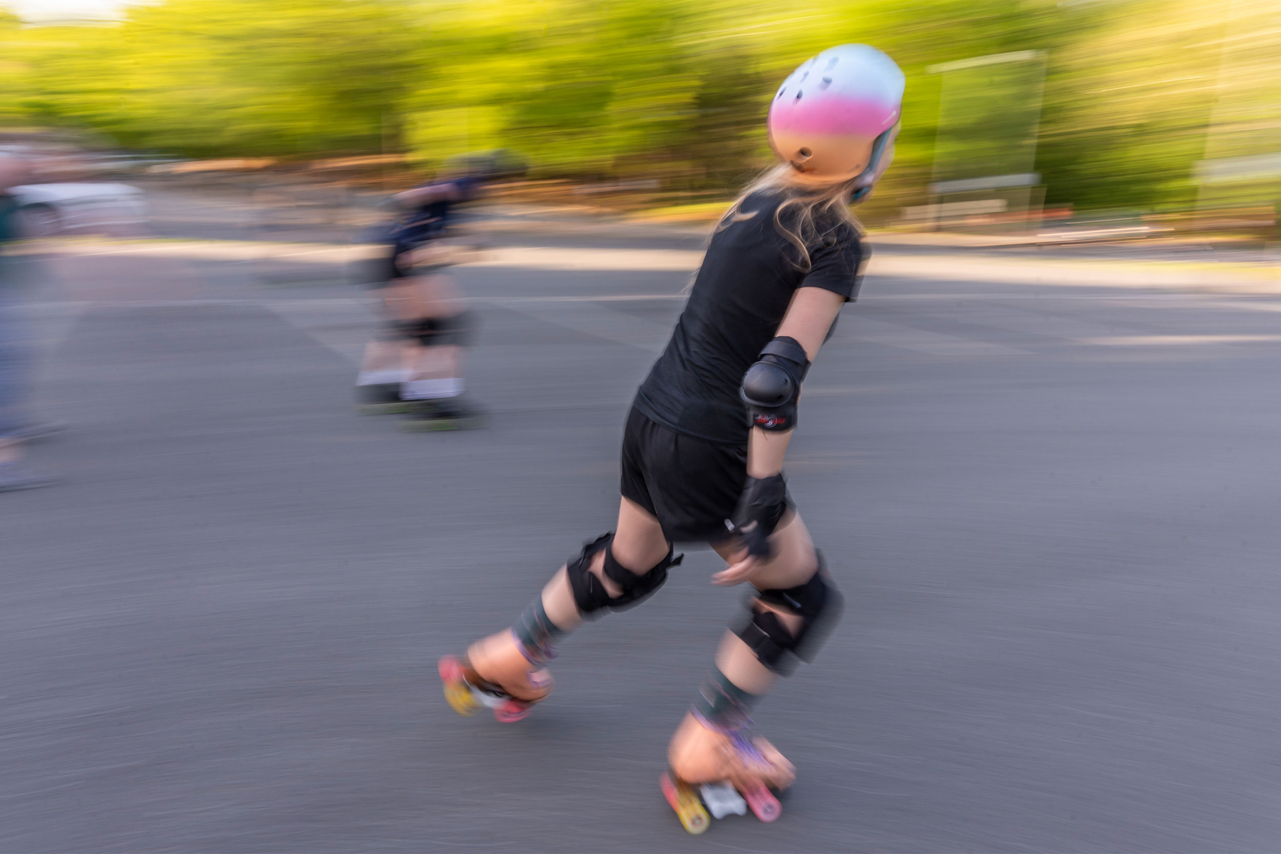 Blurred motion image following Reese Robers during derby practice