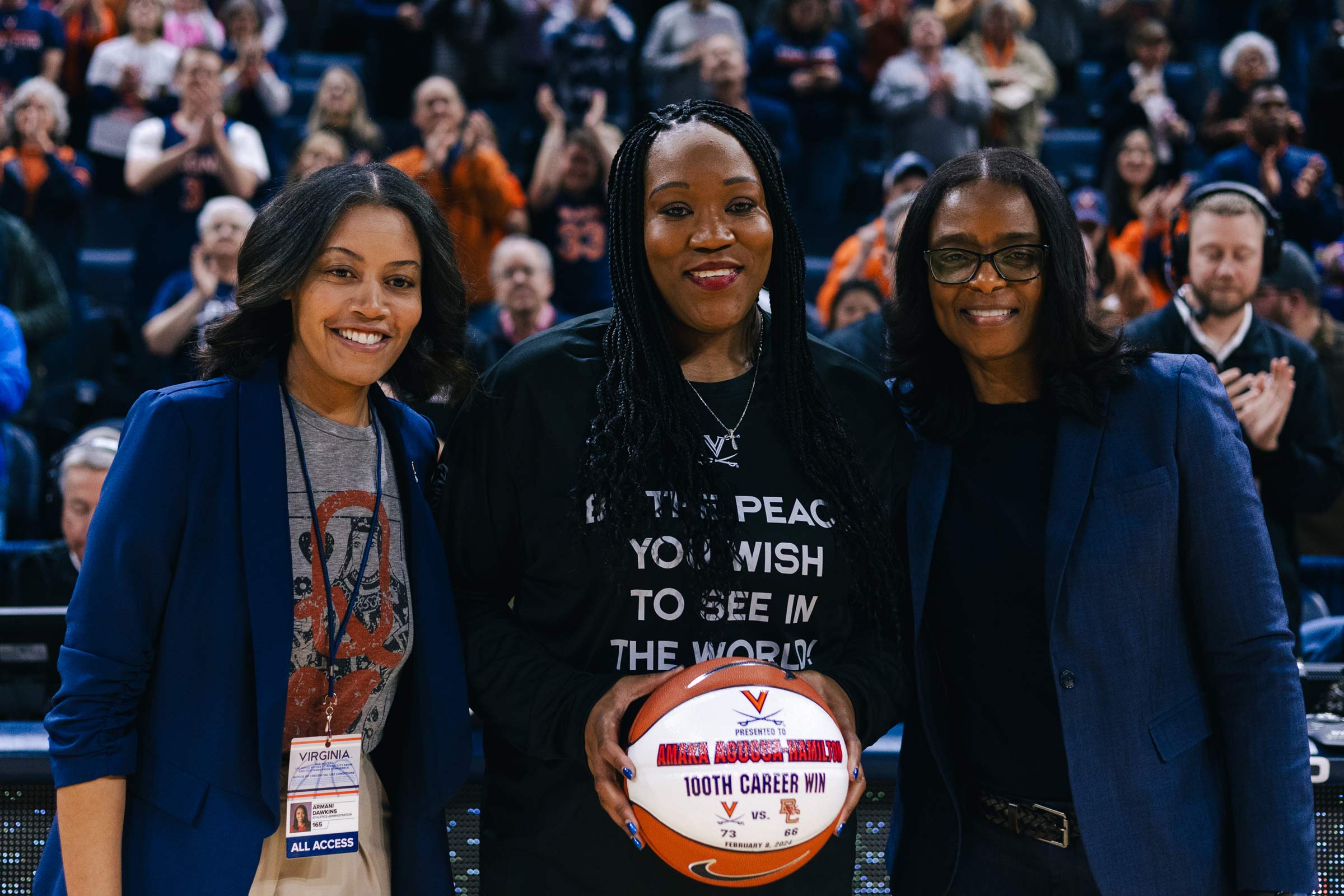 A powerful trio of women in the UVA athletics team gather together for a photo