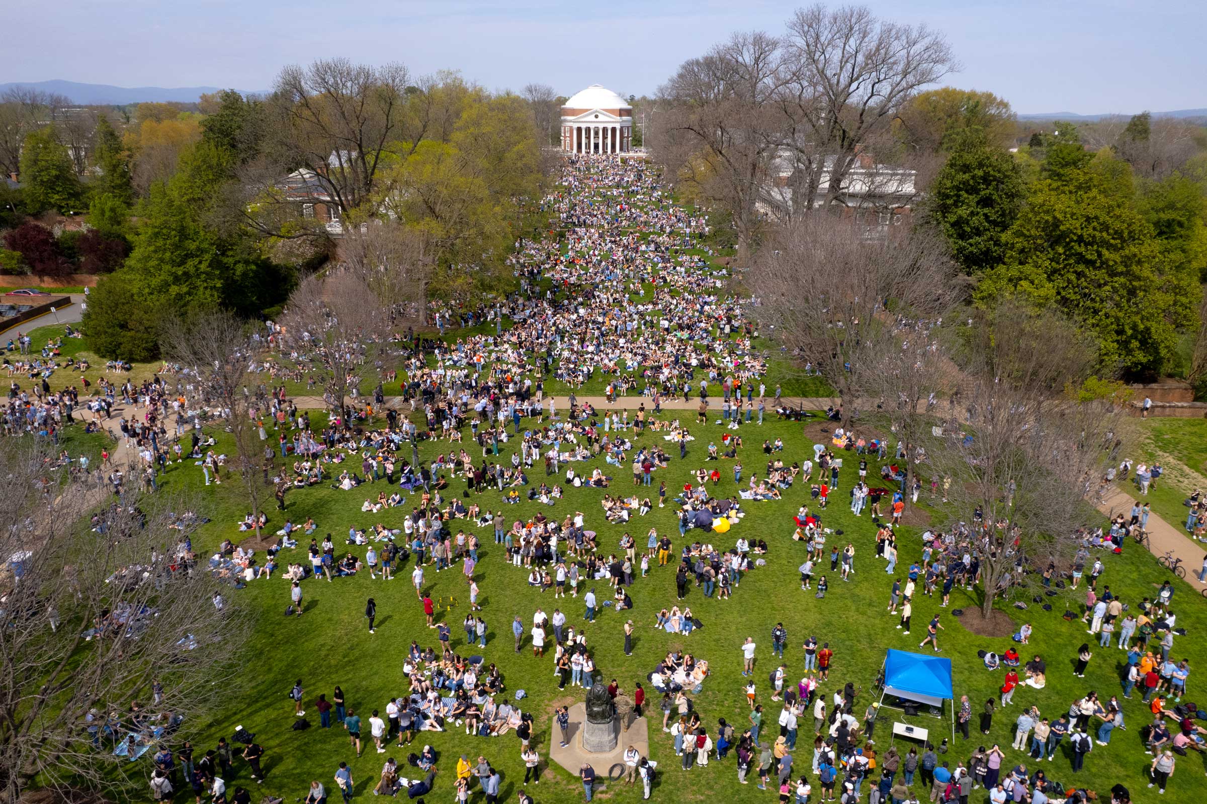 Drone aerial of the lawn full of community viewing the eclipse