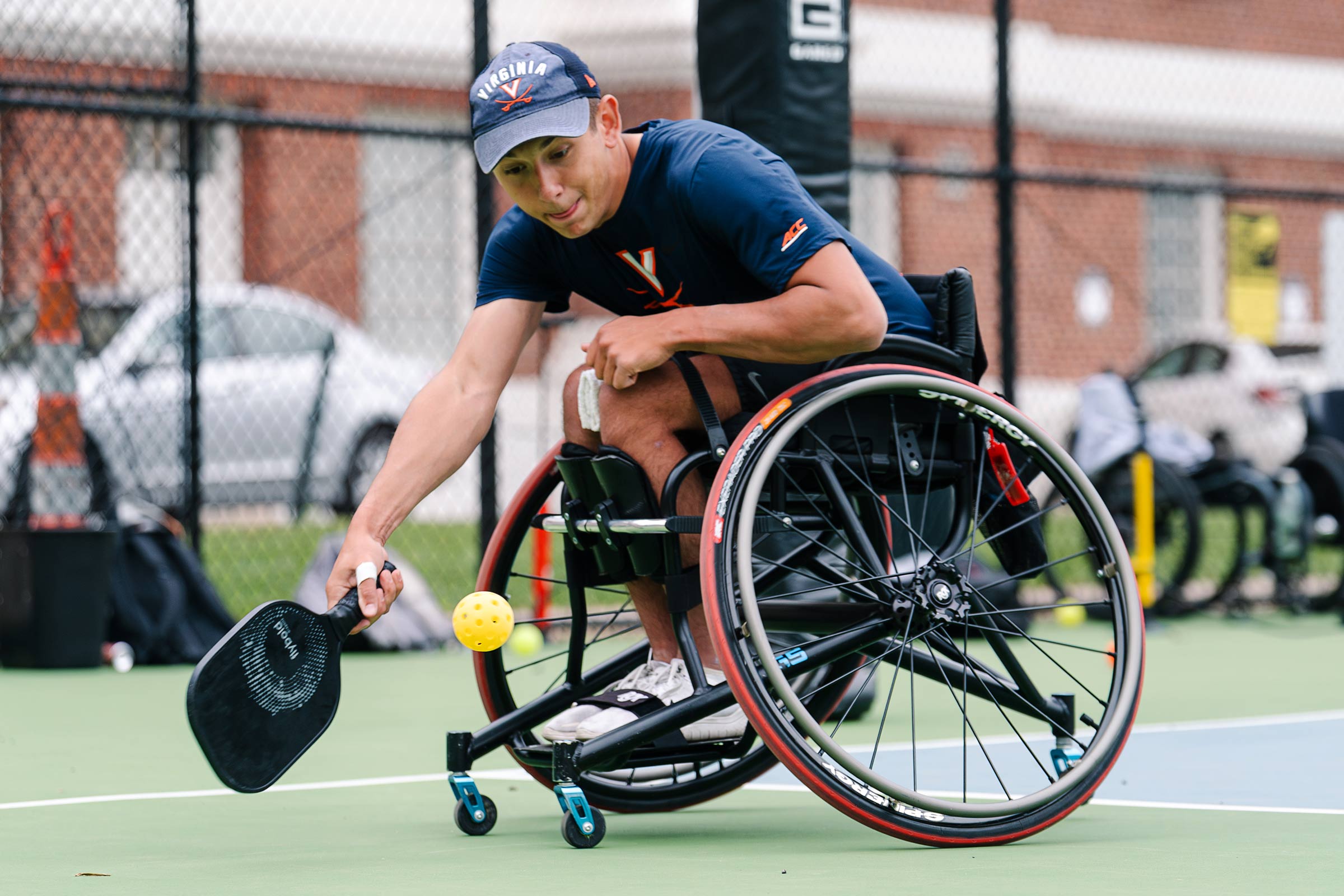 Photo of an Jacob Wald playing wheelchair pickleball.