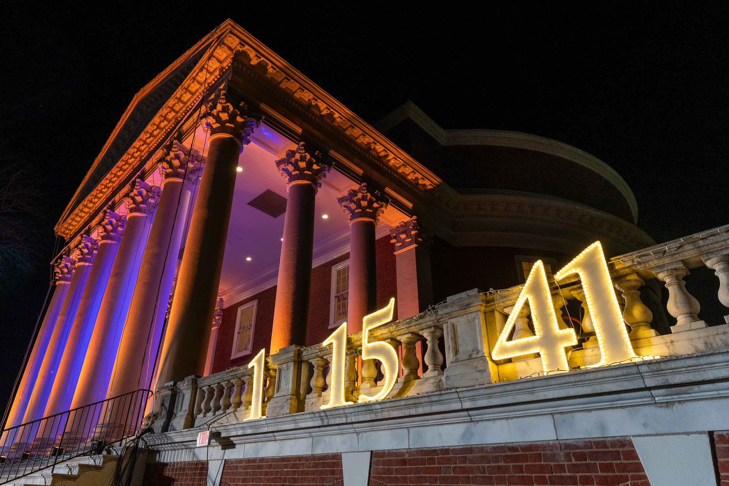 The numbers 1, 15, and 41 lit up in white lights on the Rotunda wall