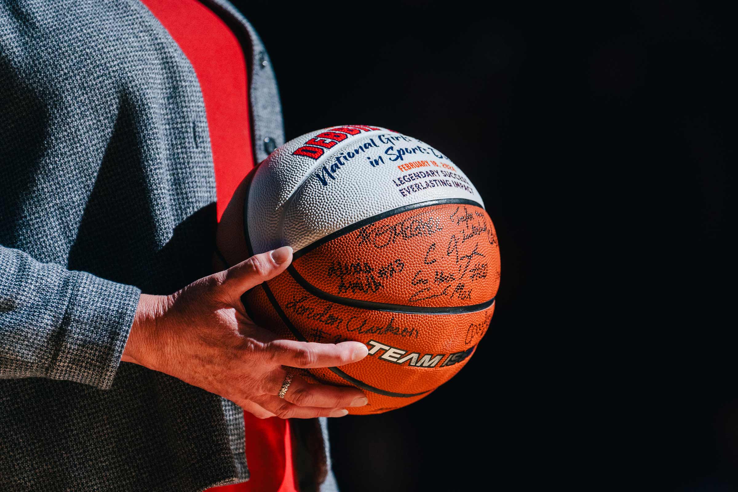 A basketball with signatures all over it