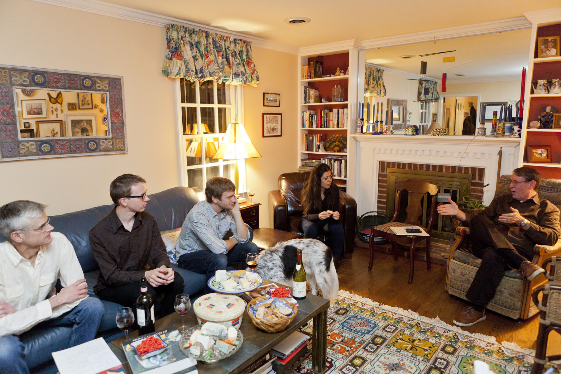 Daniel Ortiz and David Gies sit in a living room talking