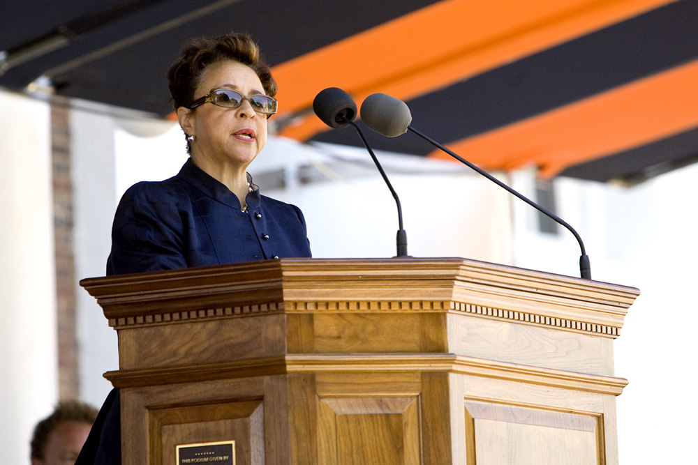 Sheila Johnson speaking at a podium to a crowd