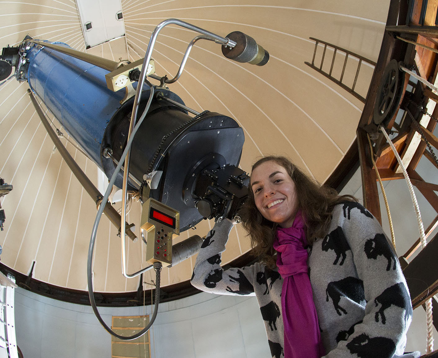 Catherine Zucker with a huge telescope