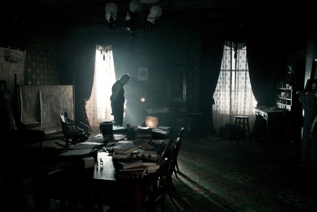 Movie scene of Lincoln standing in his office