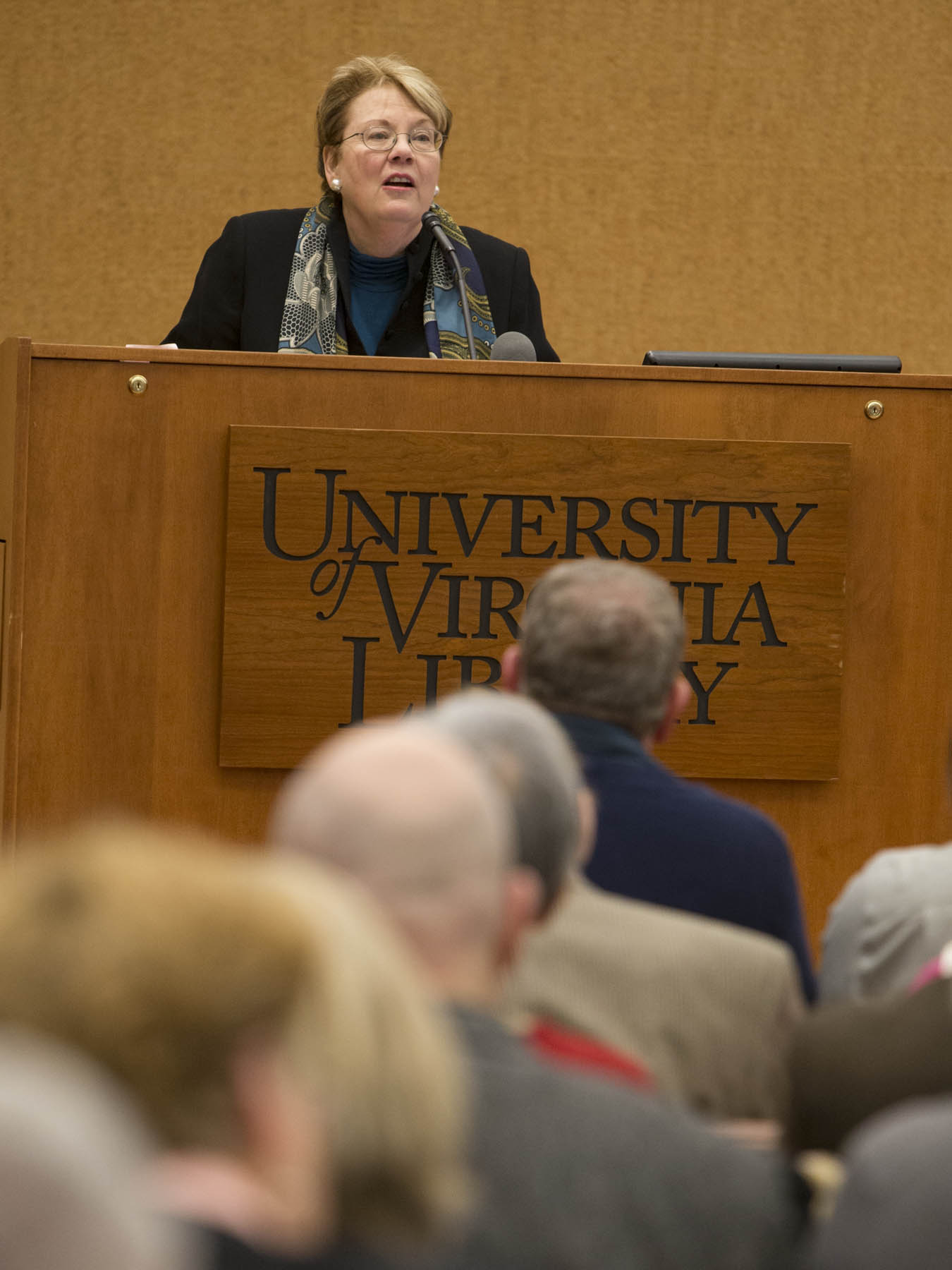 Teresa A. Sullivan speaking at a podium