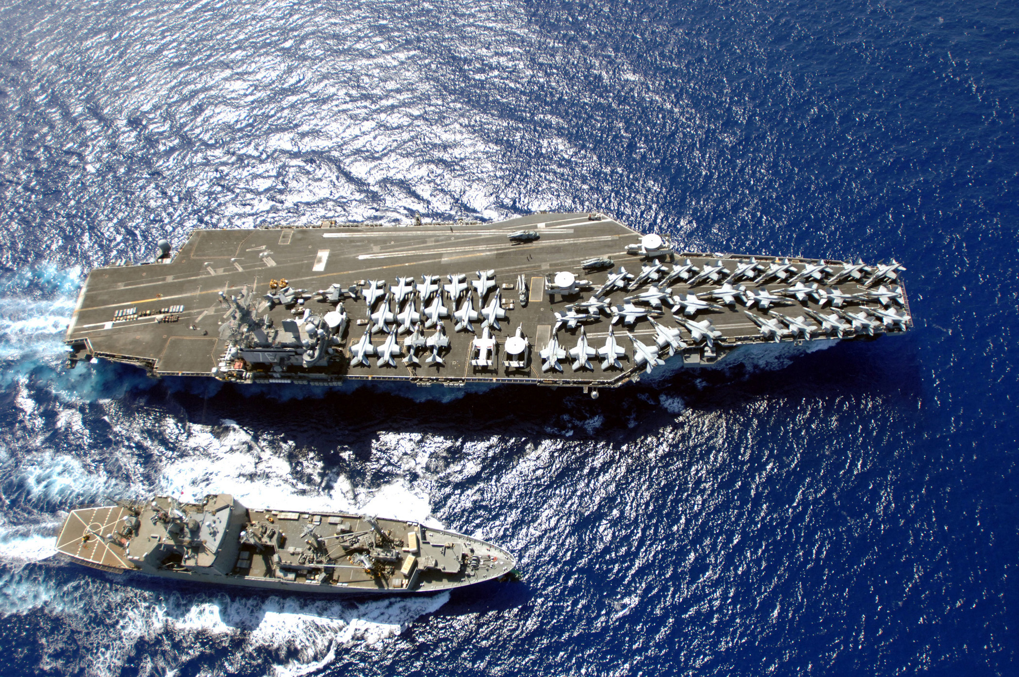 US Navy carrier full of planes on deck