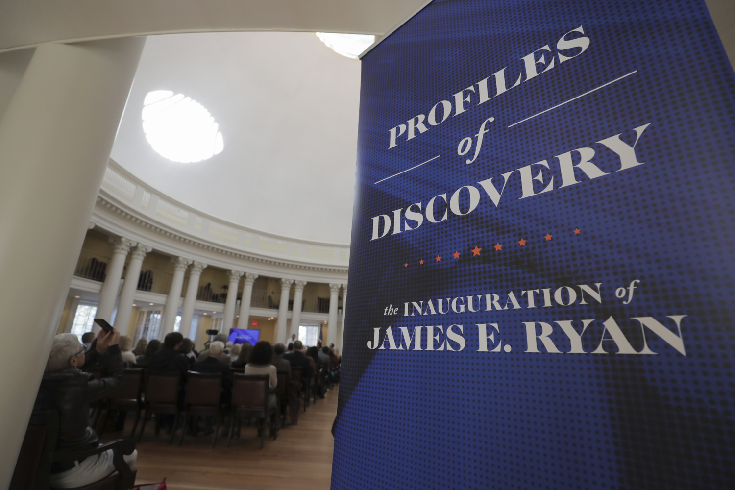 Banner inside of the Rotunda that reads Profiles in Discovery  the Inauguration of James E. Ryan