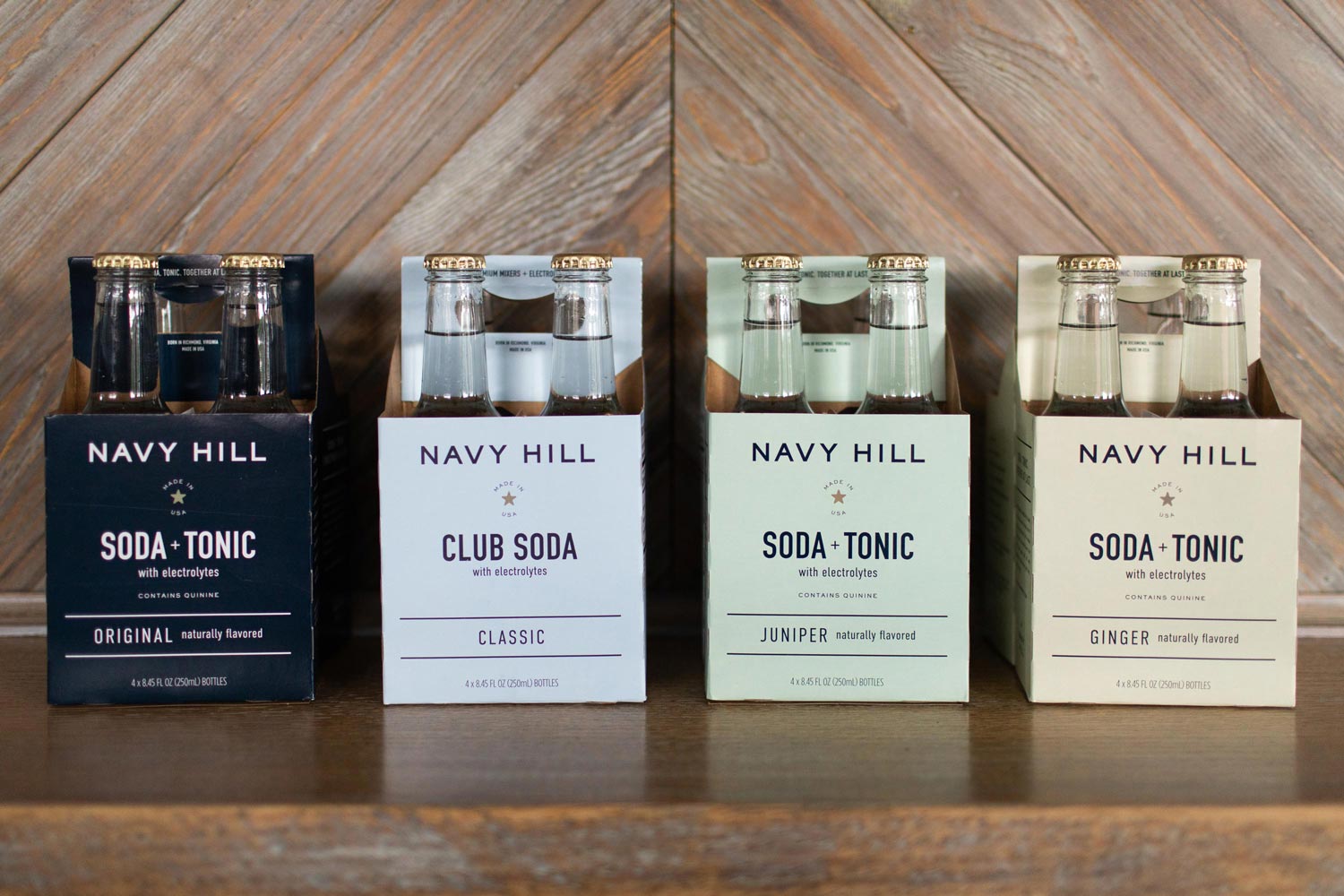 Navy Hill's sonic water in four cardboard packages by flavor