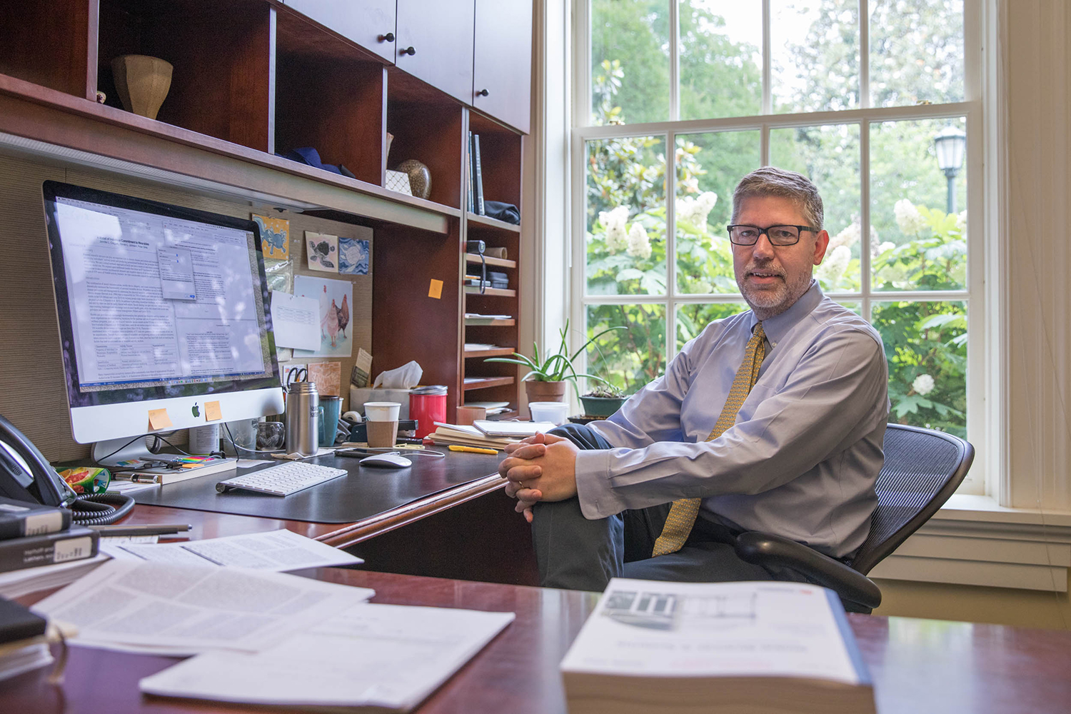 Steven L. Johnson sits at his desk working