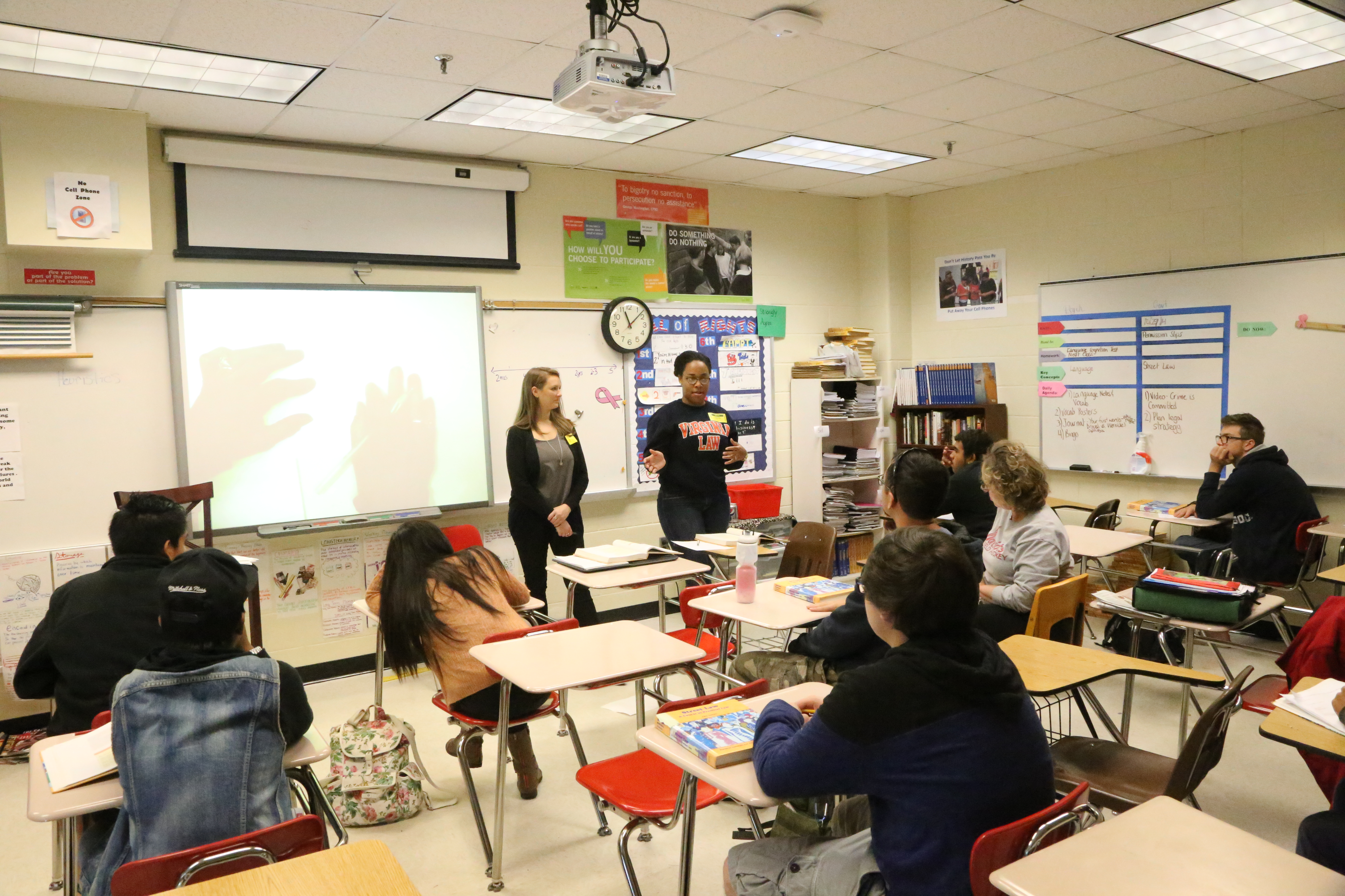 Arianna Lacerte and Jessica Douglas teach a group of middle school students