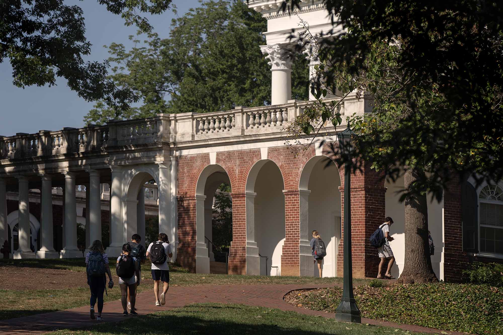 Side of the Rotunda with Students walking on the sidewalks