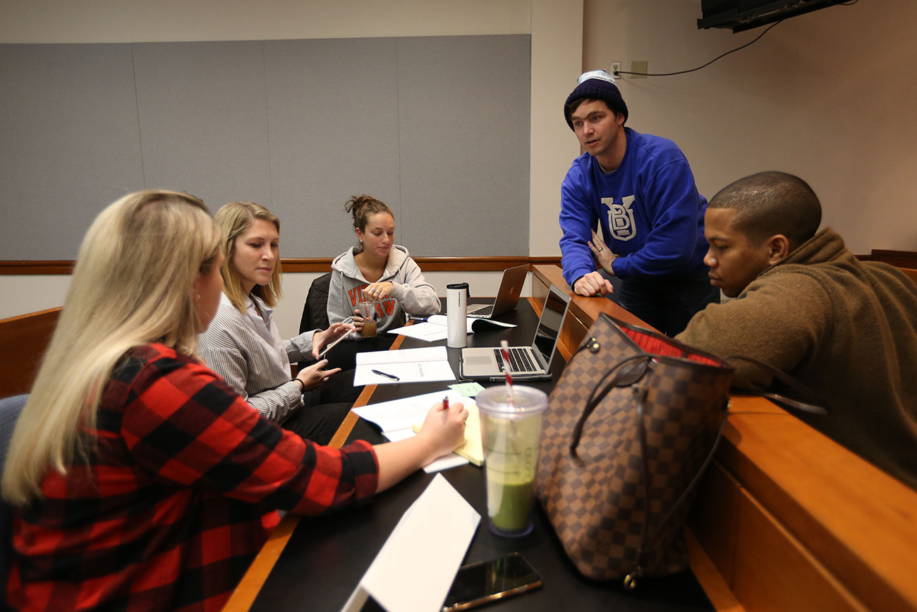 From left to right, Carrington Giammittorio, Lauren Kramer, Elana King, Philip Hurst and P.J. Harris participate in a group negotiation 