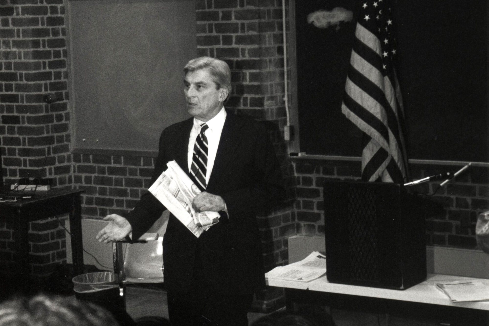 Former U.S. Sen. John W. Warner speaking to a class, black and white image