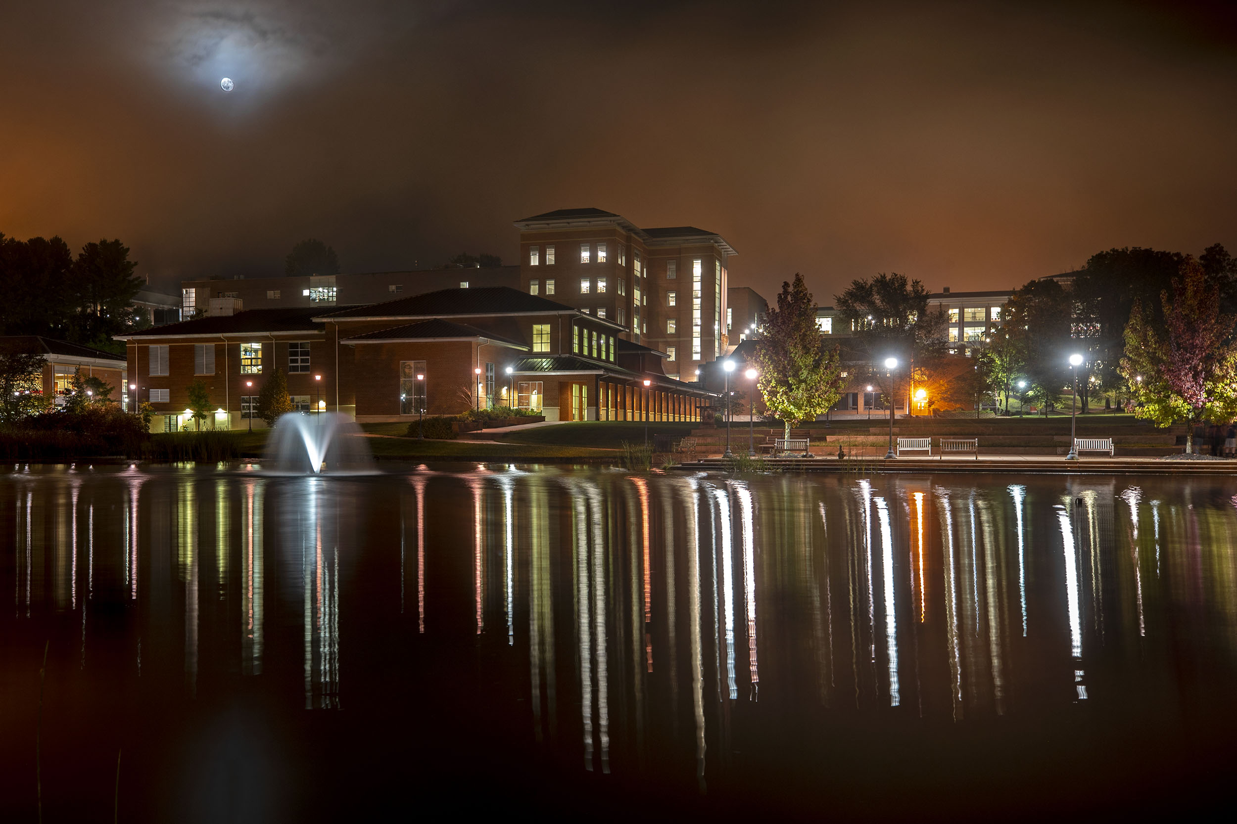 UVA Wise campus with lights reflecting off of the lake