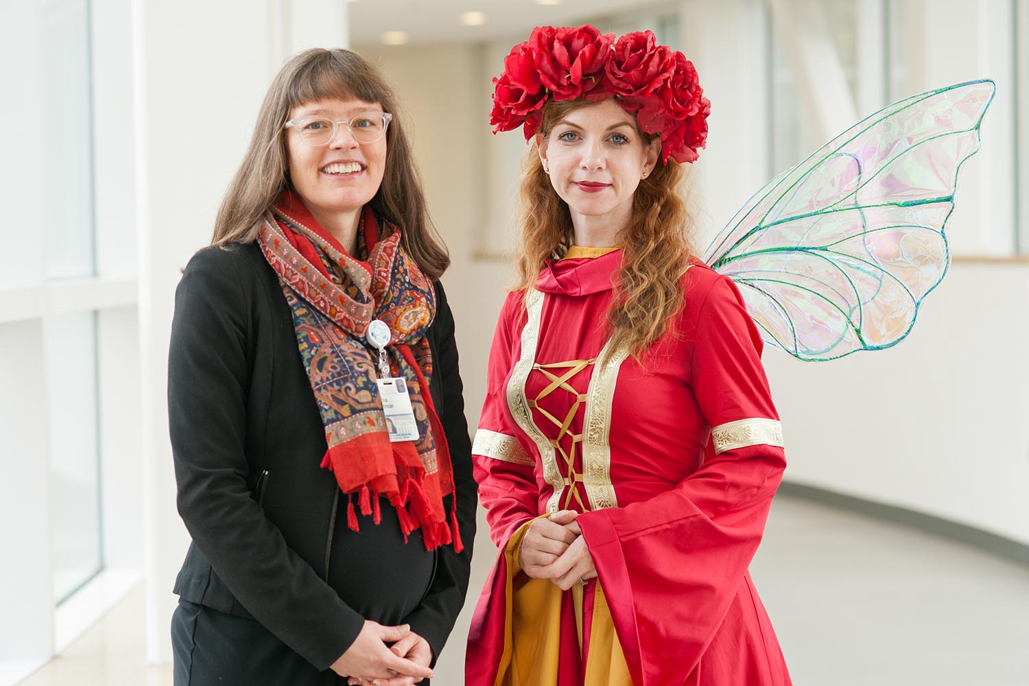 Lydia Witman, left, stands with a book fairy