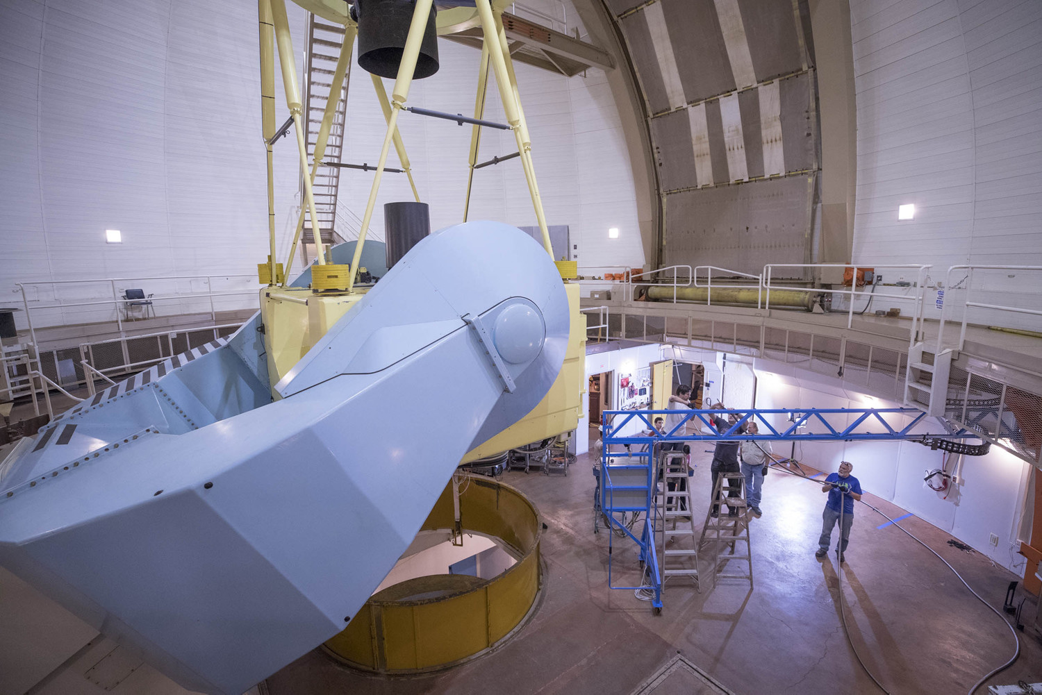 The team from UVA worked in the dome room of the telescope on the arm and connection for the spectrograph as part of the APOGEE project. 
