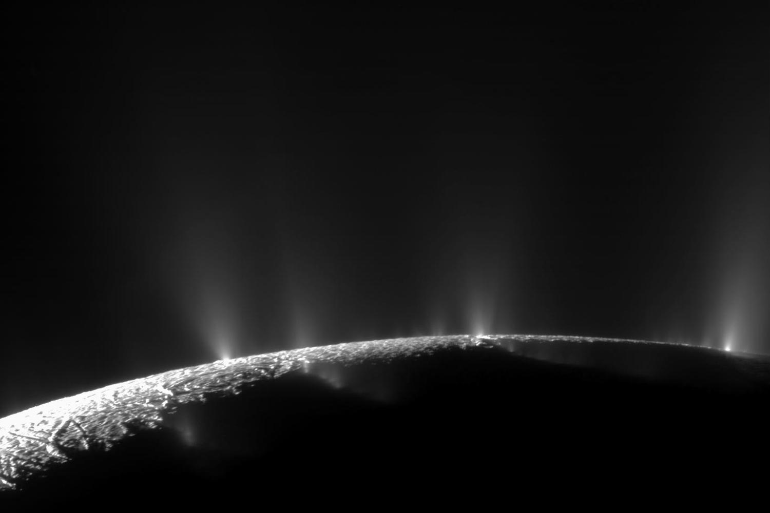 Enceladus has plumes of water ice and vapor come out of its surface