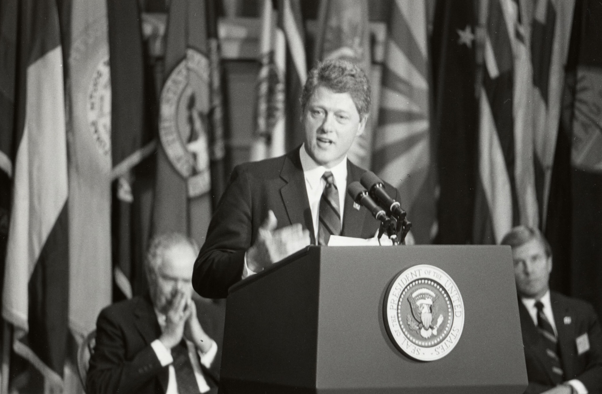 President Clinton talking at a podium