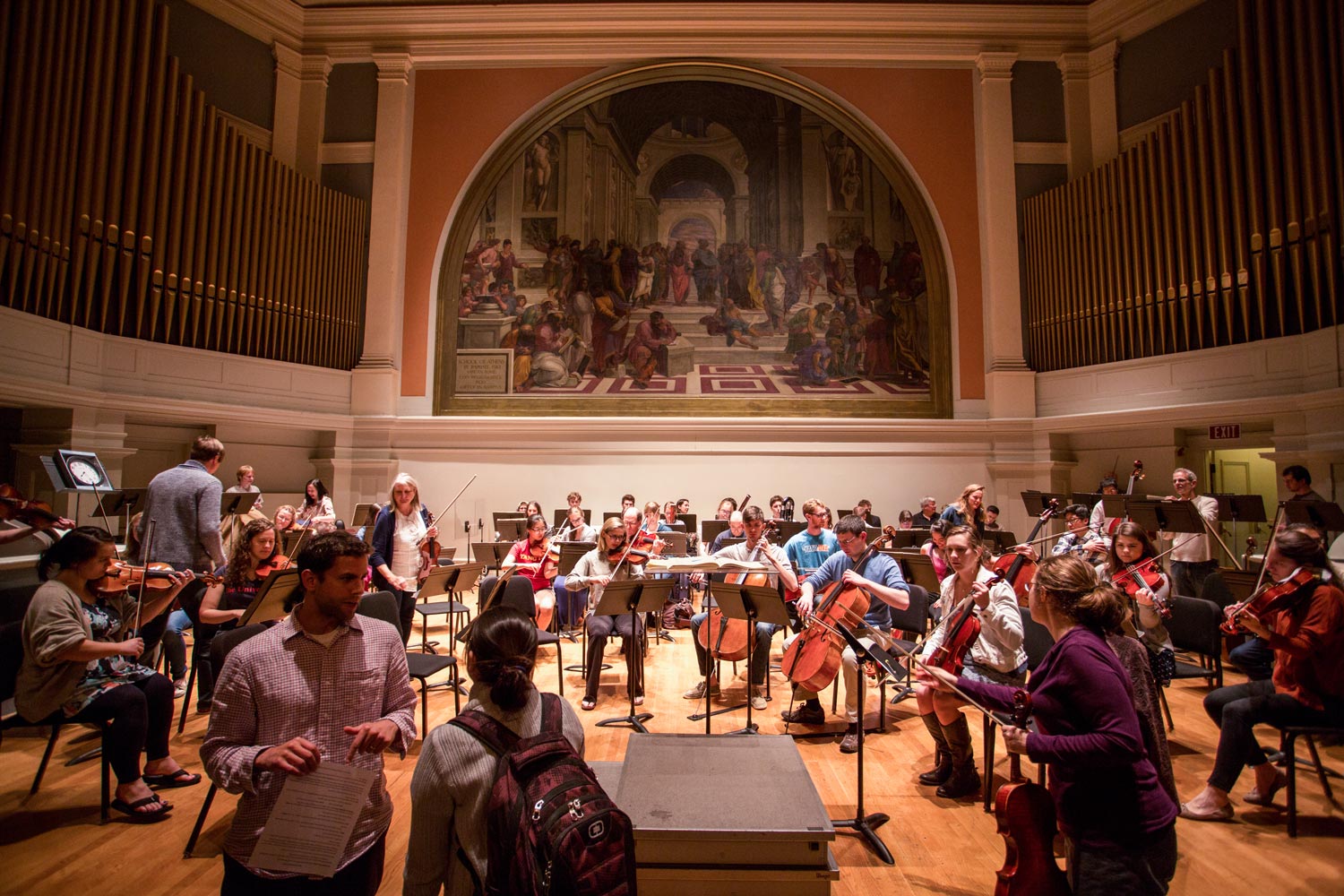 Orchestra practicing in Old Cabell Halls Auditorium
