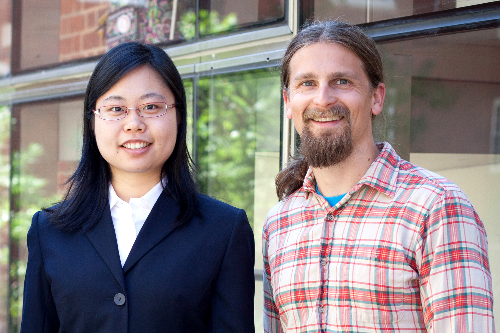 Lin Bai, Ph.D. candidate in electrical and computer engineering, and Jon Bellona, Ph.D. candidate in music. (Photos courtesy of the Data Science Institute)