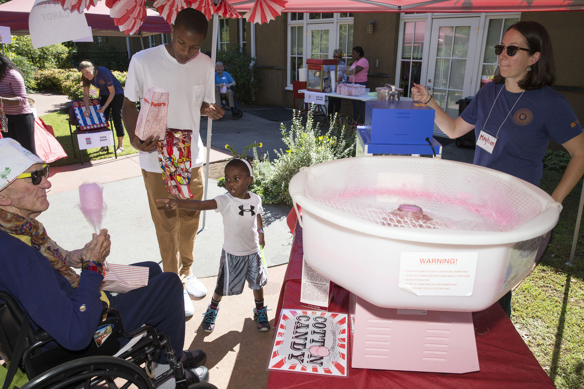 What’s a carnival without cotton candy? Workers from the Office for Diversity and Equity and the psychology department ran a carnival for preschoolers and senior citizens at JABA.