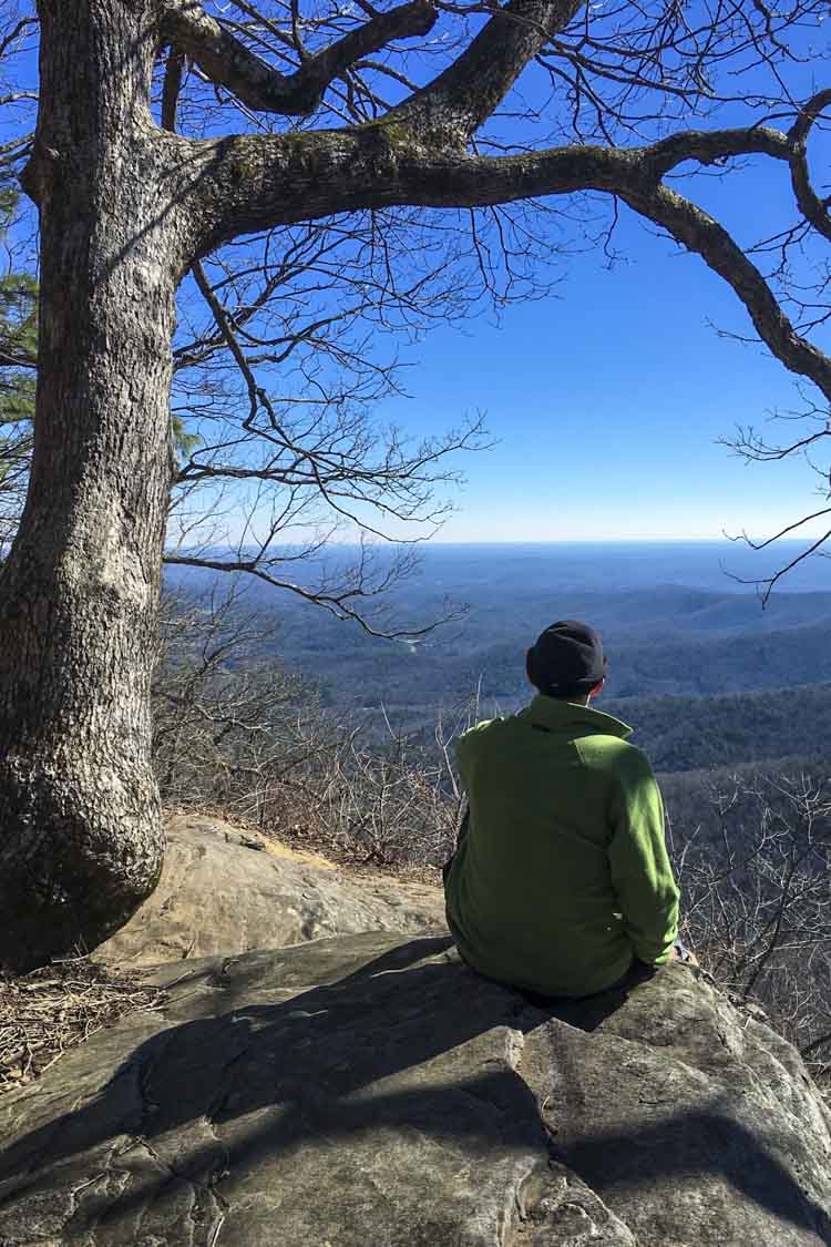 Underhill looks out at the mountains at an overlook on the Appalachian trail