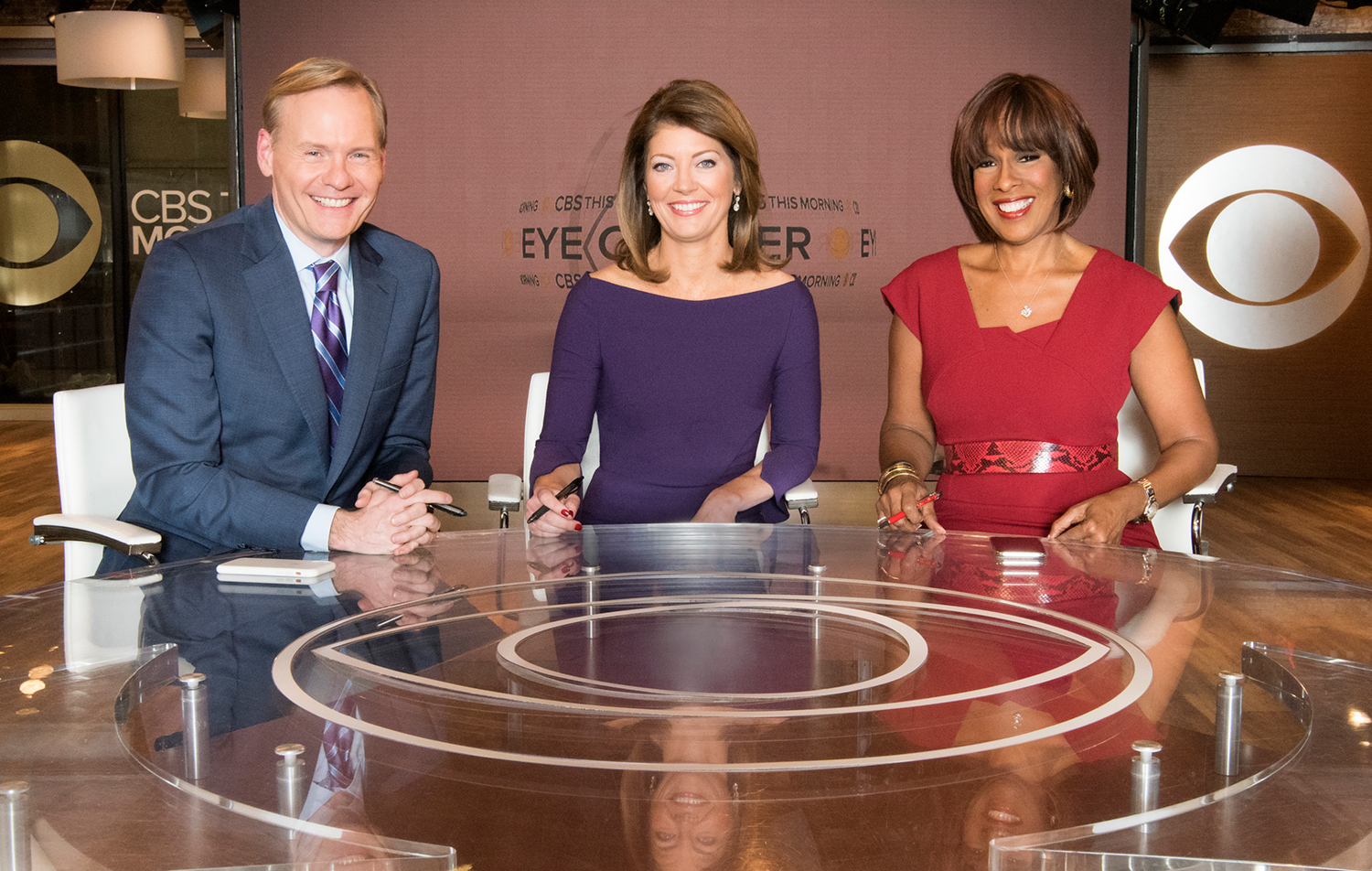 Norah O’Donnell, Gayle King and John Dickerson smile for the camera