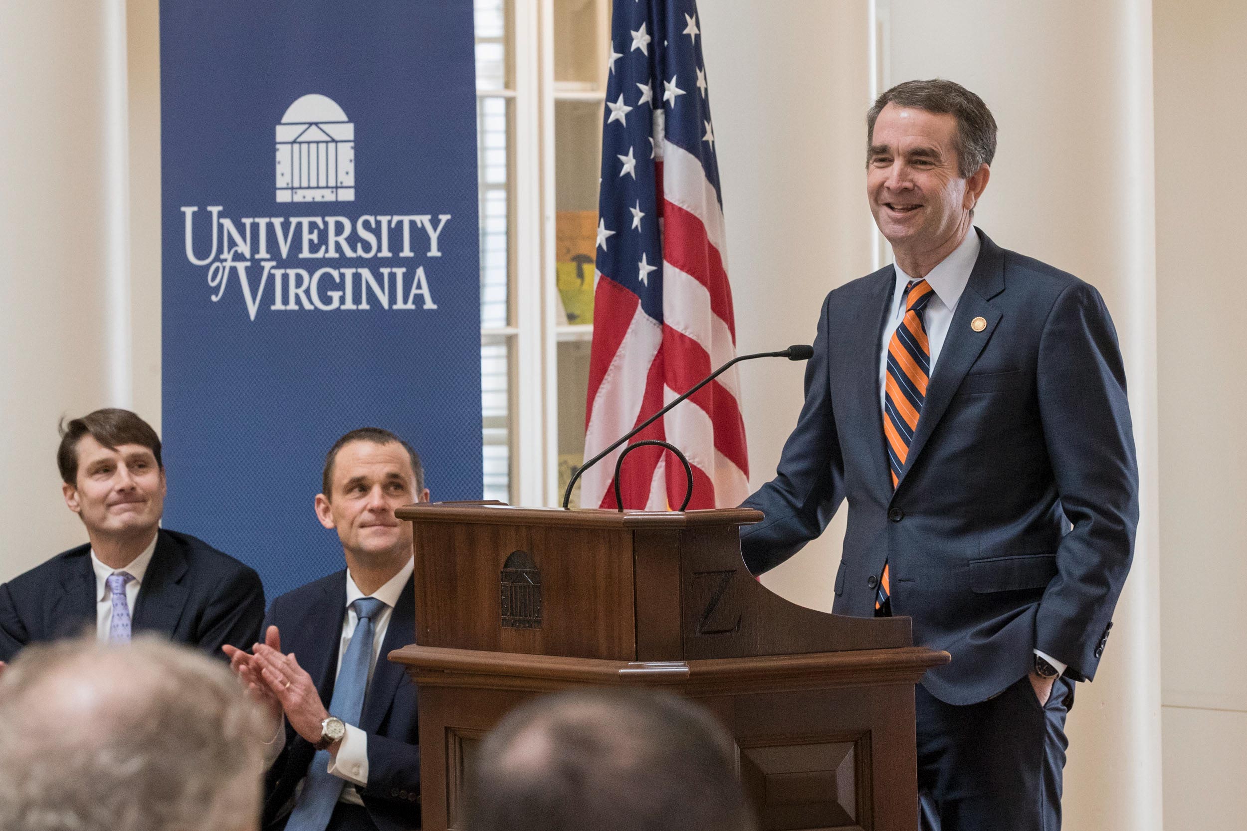 Ralph Northam giving a speech at the podium in the Rotunda