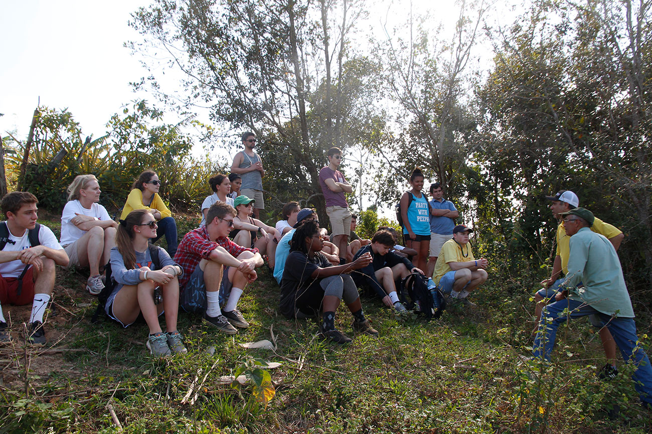 Students listen to farmers at El Paraiso in Vinales, Cuba, home to an organic farm and family-owned restaurant. (Photo courtesy of Mark White)