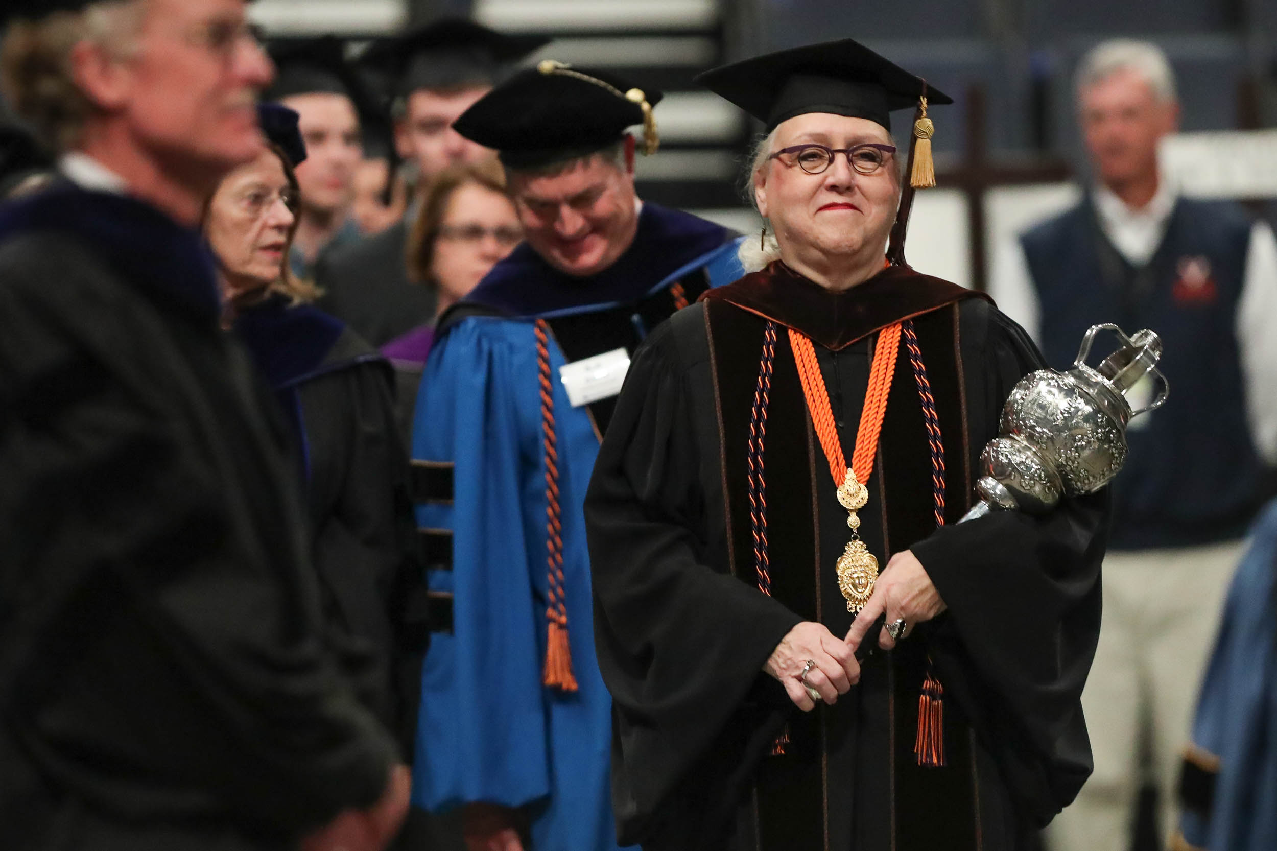 Gweneth West, a drama professor, leads the academic procession at Friday’s Fall Convocation. 