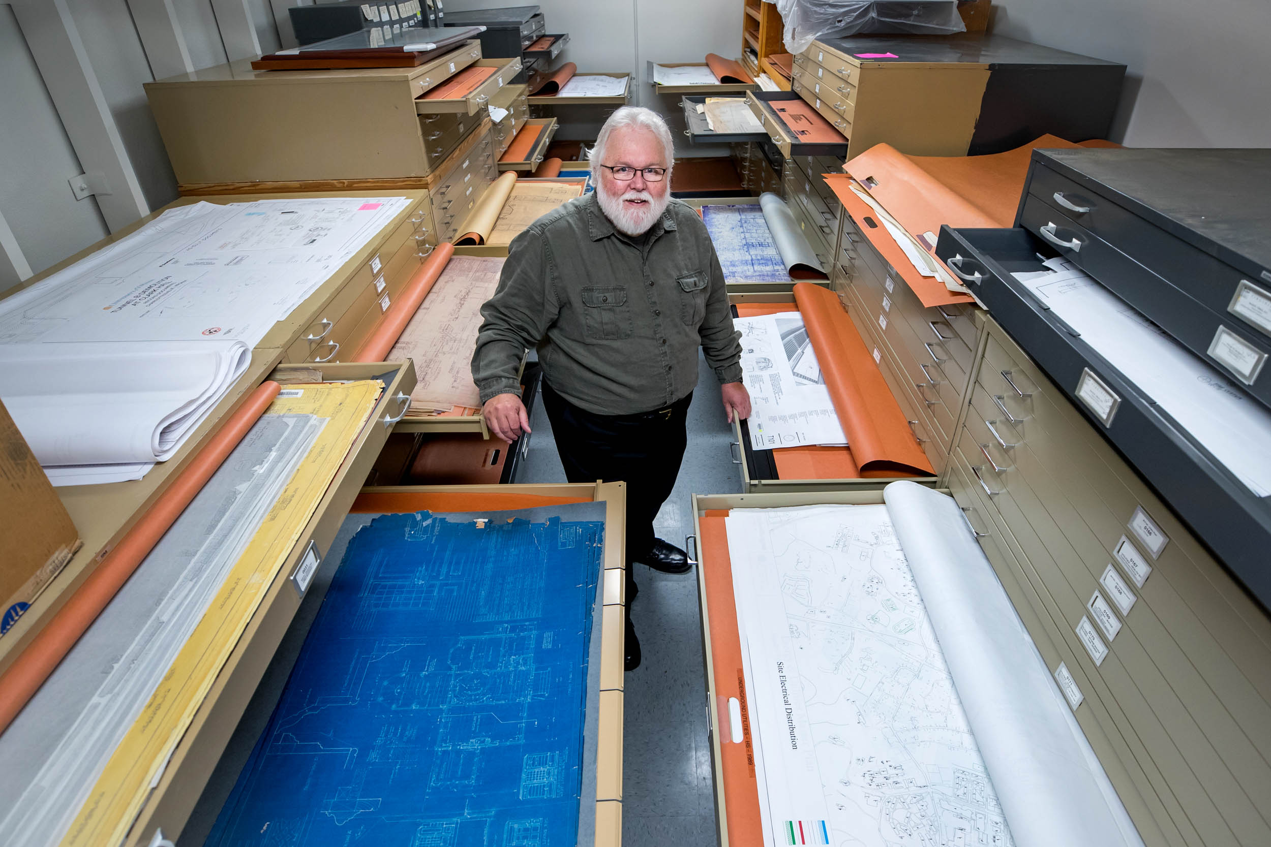 Garth Anderson manages an extensive database of building designs that includes hundreds of years of building plans. (Photo by Sanjay Suchak, University Communications)