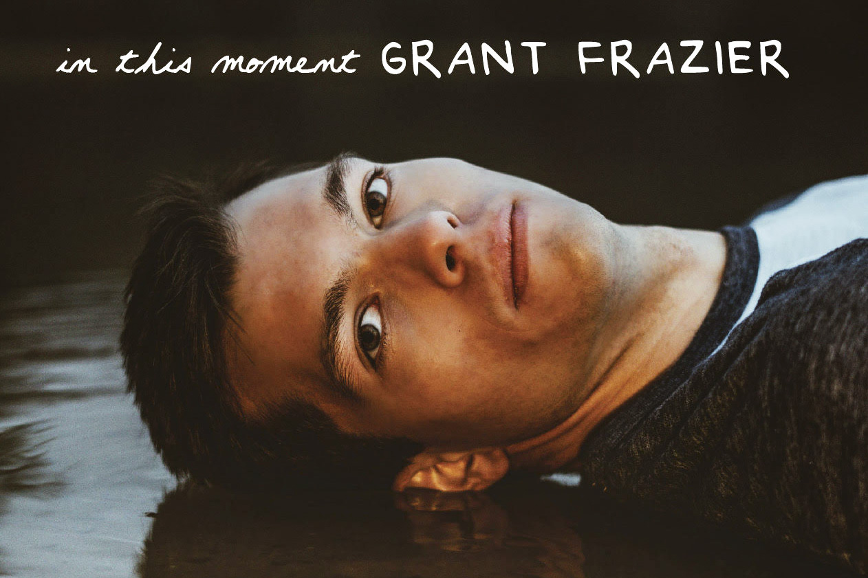 Album cover of Frazier laying in water, seen from shoulder up, with the text In this moment Grant Frazier