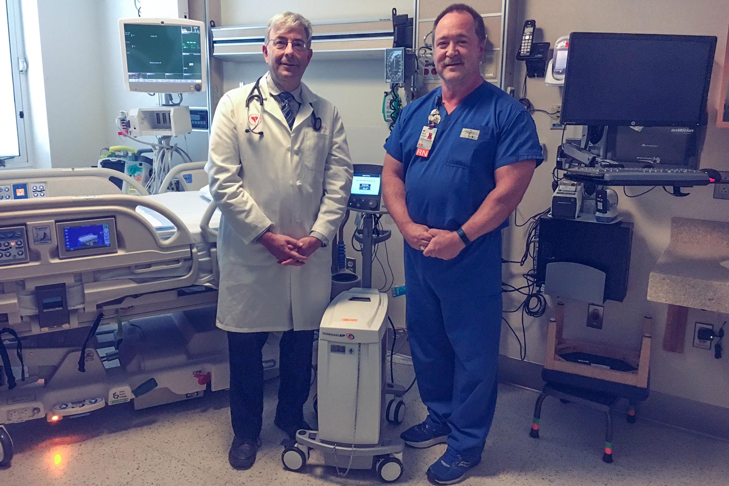 Dr. Lawrence W. Gimple, left, and Mark Adams, nurse manager of UVA's Coronary Care Unit,&nbsp;were among the researchers who developed the model.