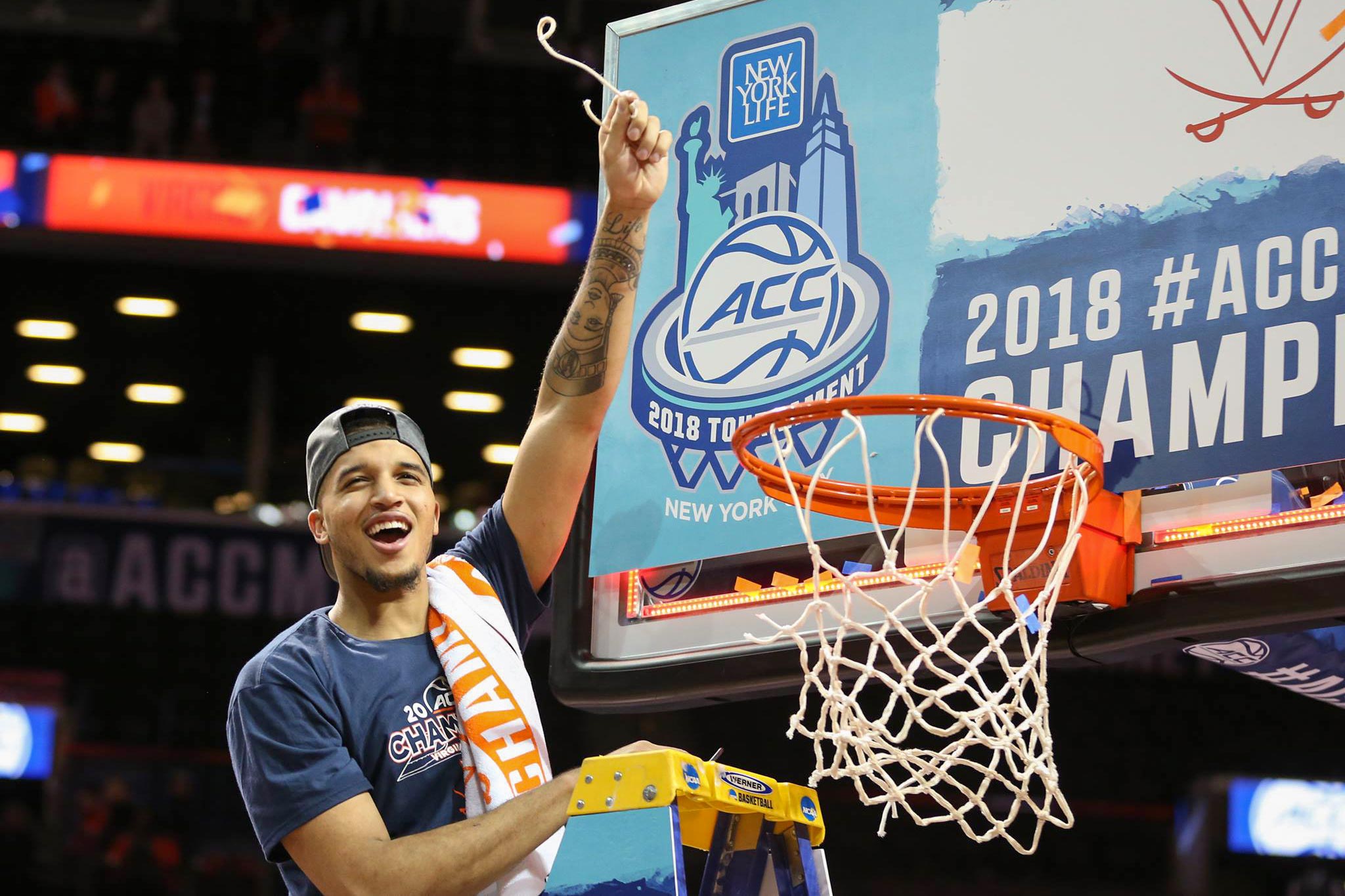 Wilkins cutting down the ACC championship basketball net