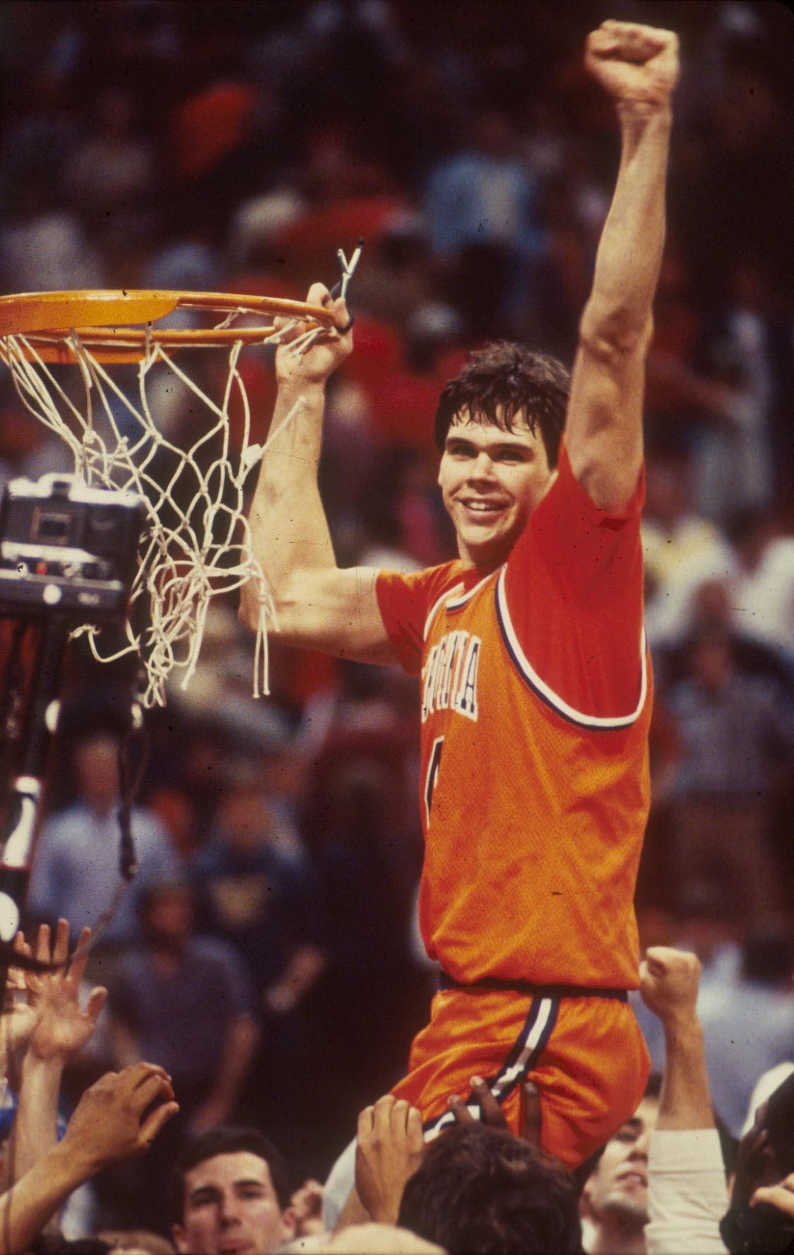 Old image of Jimmy Miller cutting down net after a win 