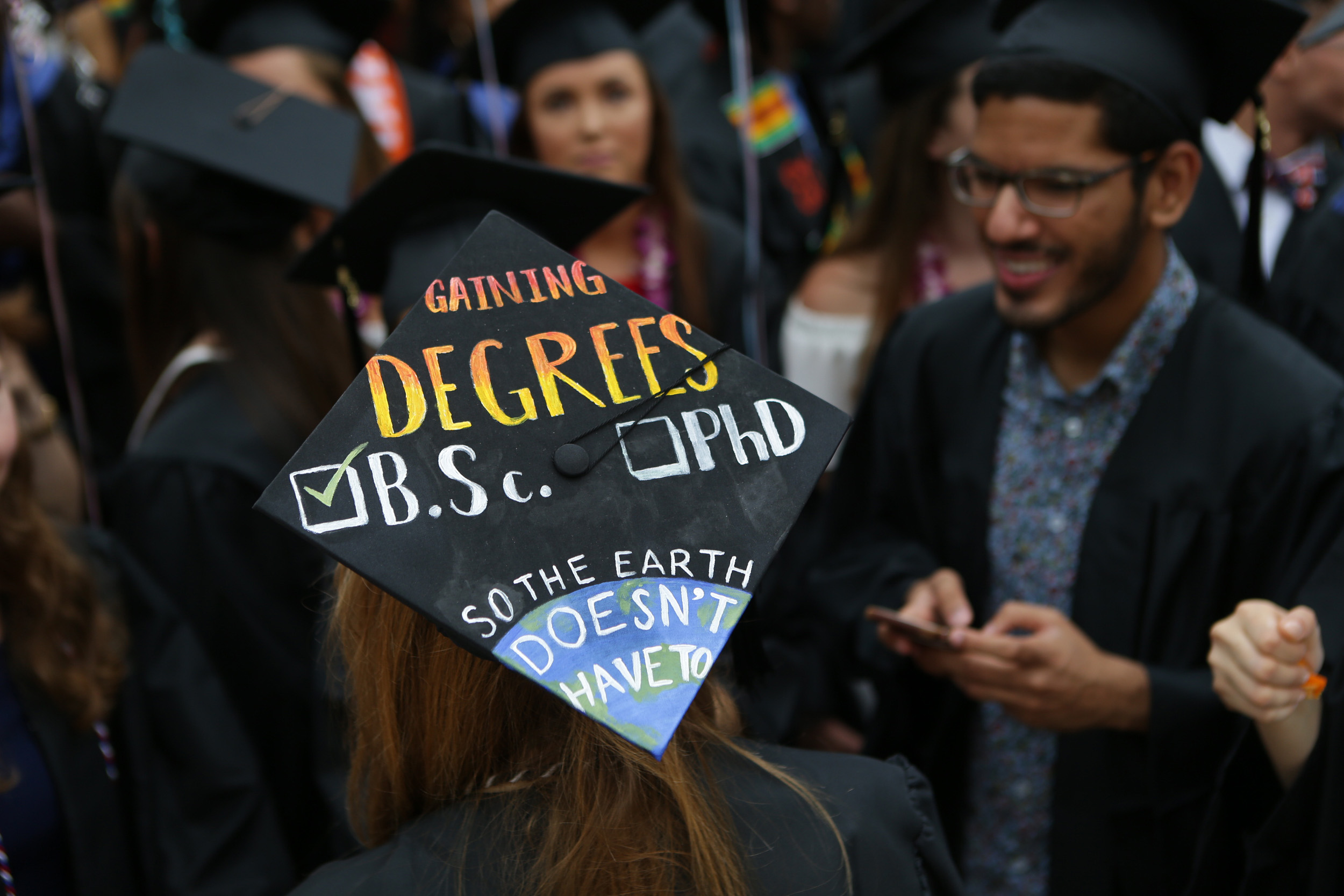 graduation cap reads: Gaining degrees B.Sc. (checkbox - checked). PHD (checkbox empty). So the earth doesn't have to 