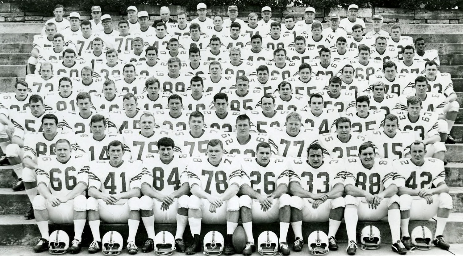 Black and white photo of the UVA football team in 1967