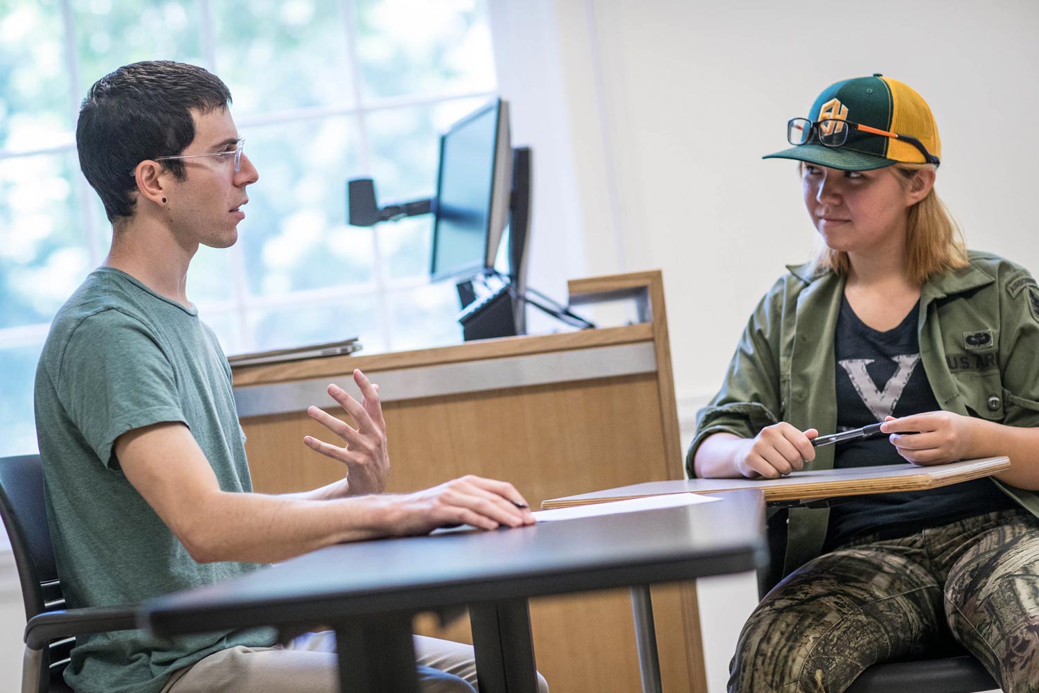 Matthew Andler, a doctoral student in philosophy who taught a summer course on “Masculinity,” talked with Sardana Coyle, a rising second-year student from Mathias, West Virginia after class. 