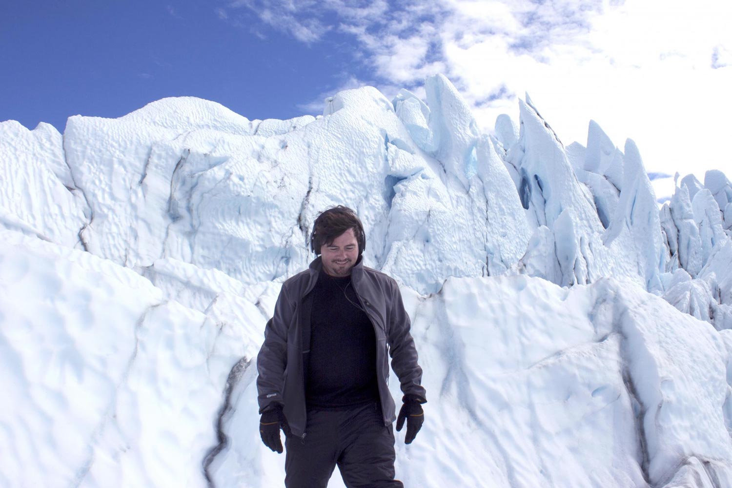 Matthew Burtner standing on a glacier in Alaska