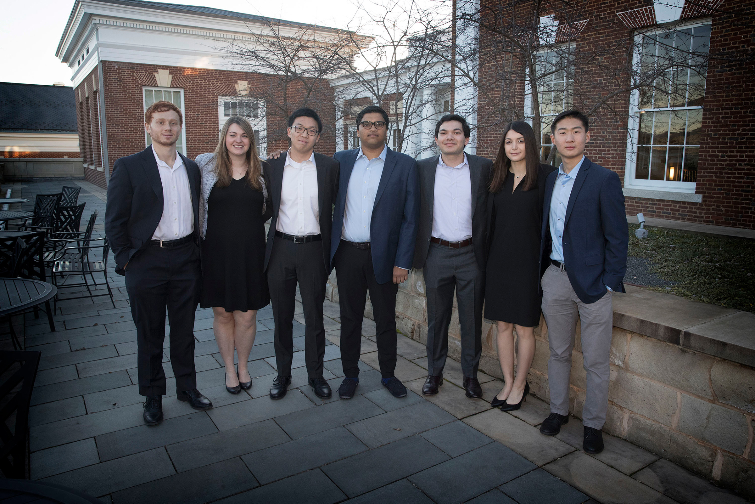 Left to right: Josh Blutfield, Joanna Shaw, Nathan Lin, Abhijith Chaganti, Christopher DeSouza, Marisa Lombardi and Richard Song stand together for a picture