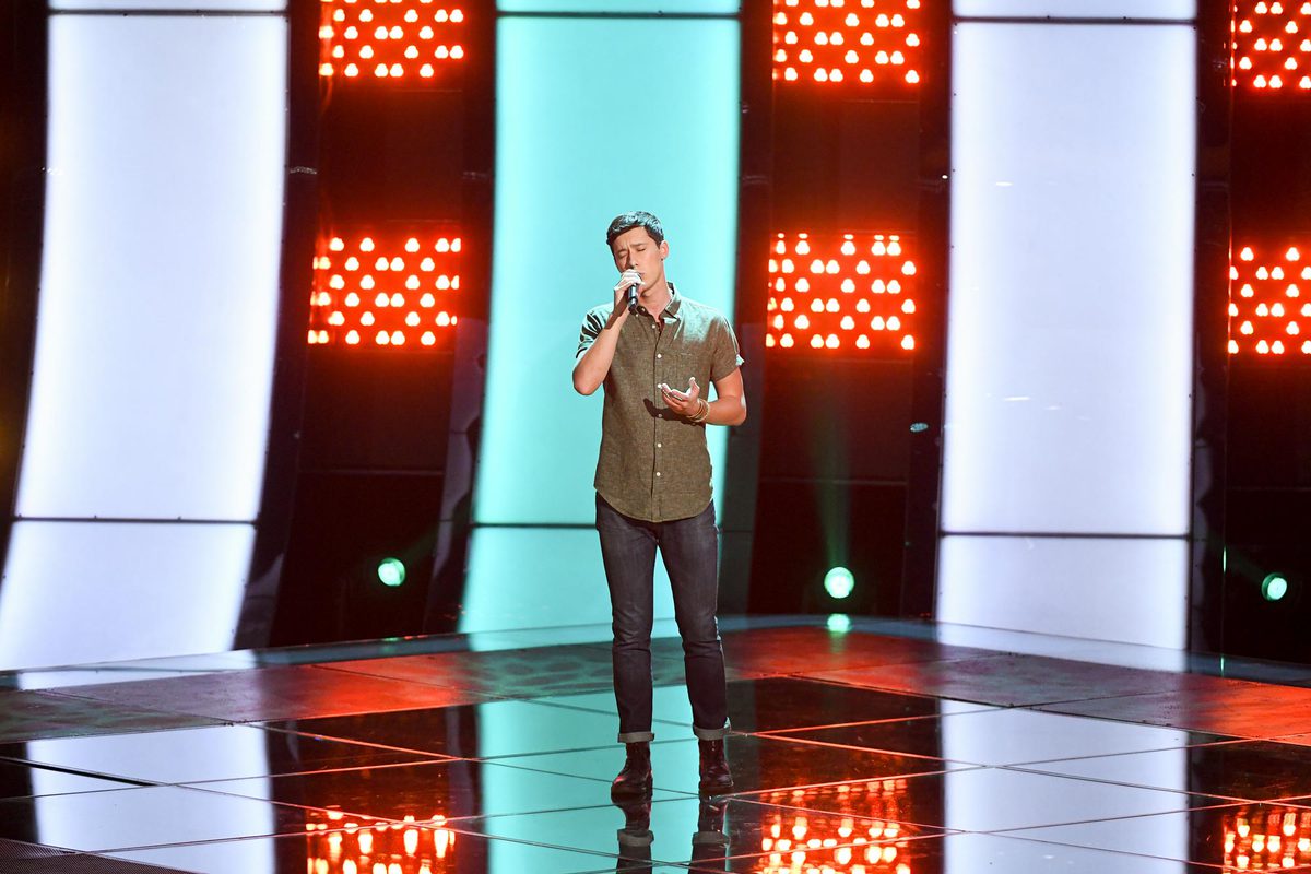 Micah Iverson performs on The Voice stage during a blind audition