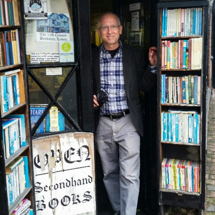 Michael Levenson standing in a book store in London