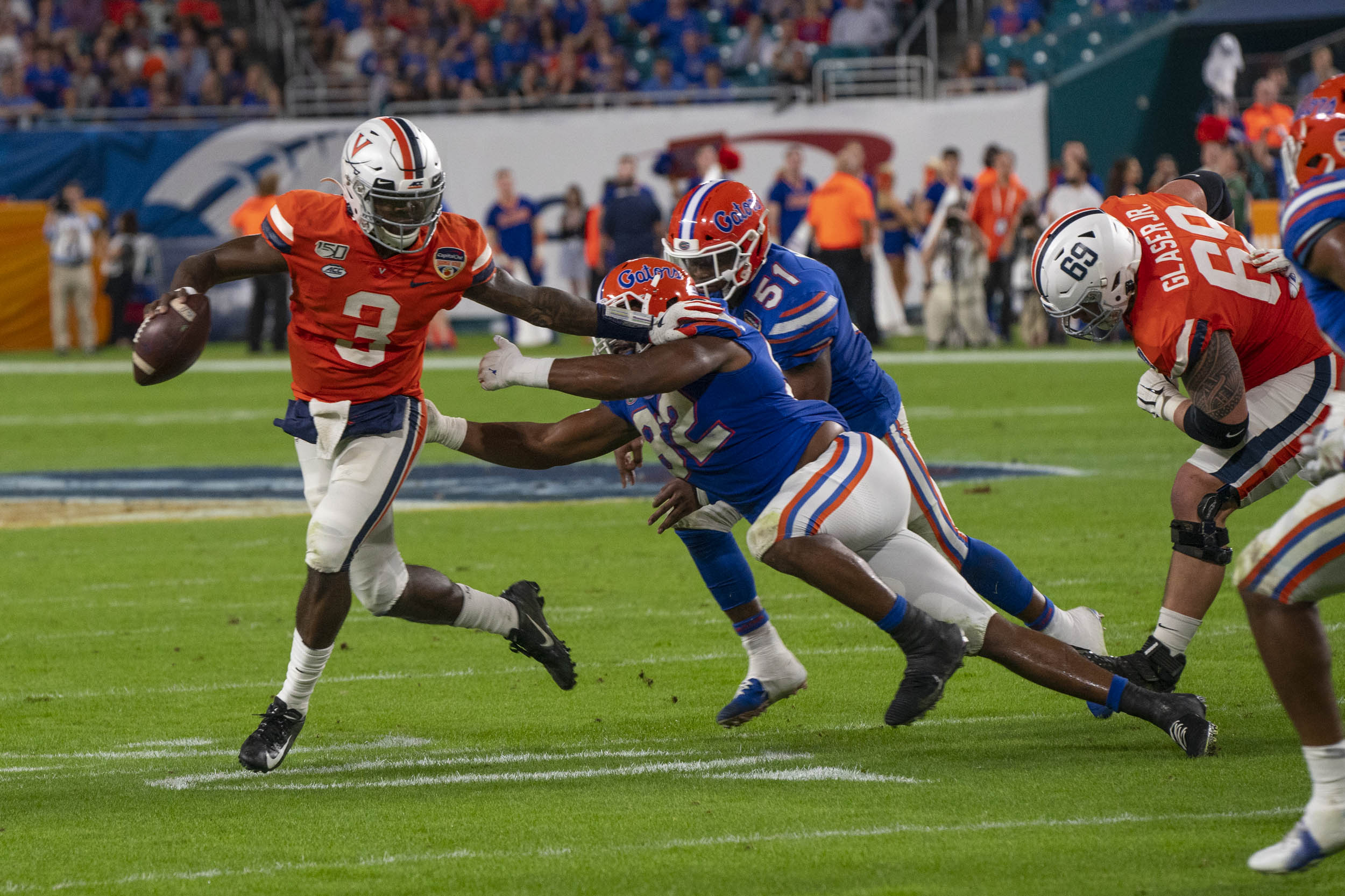 Perkins running away from a Florida defender 