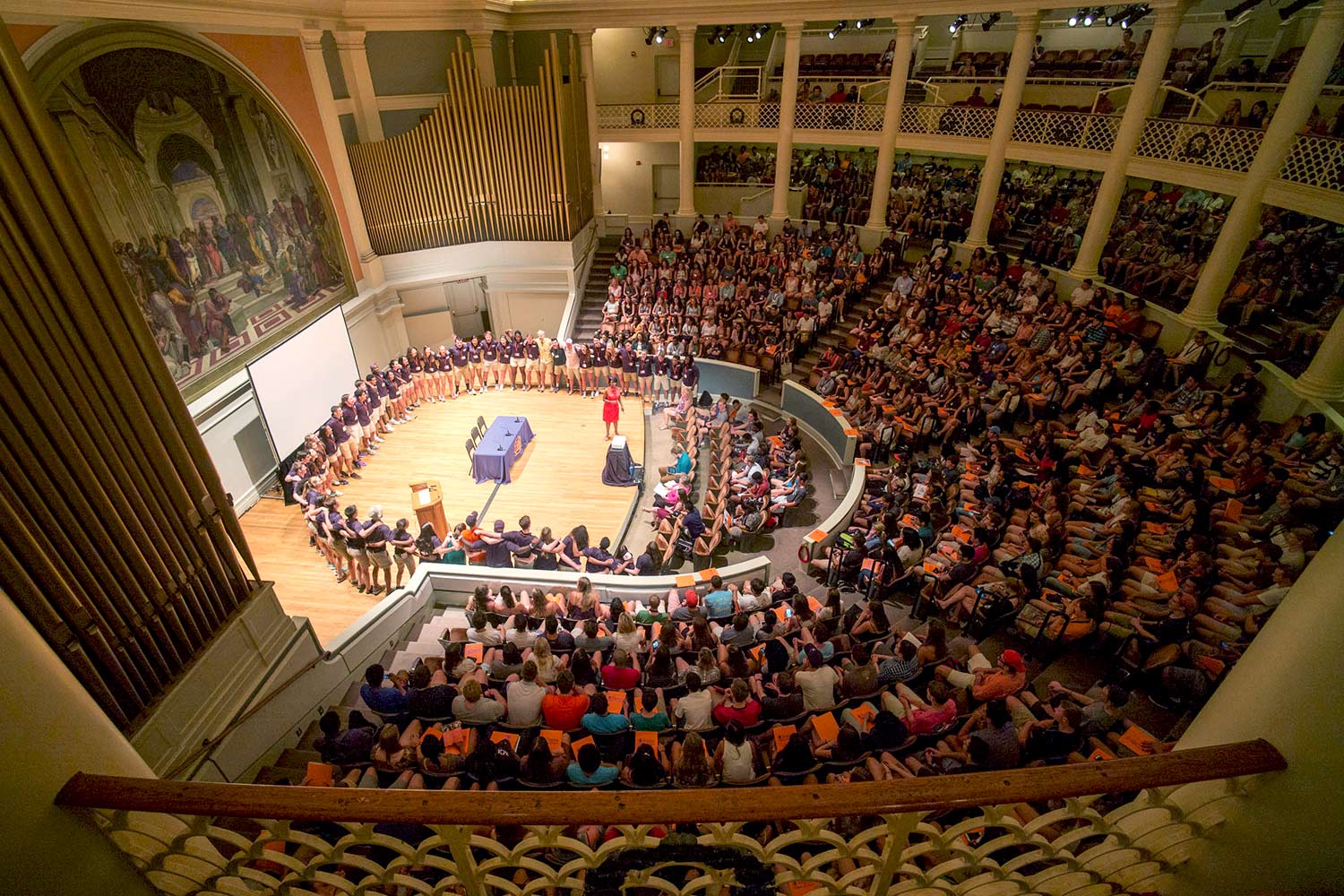 Student orientation leaders, on stage, are introduced to incoming students during the opening session of a recent orientation in Old Cabell Hall Auditorium. (Photo by Sanjay Suchak/University Communications)